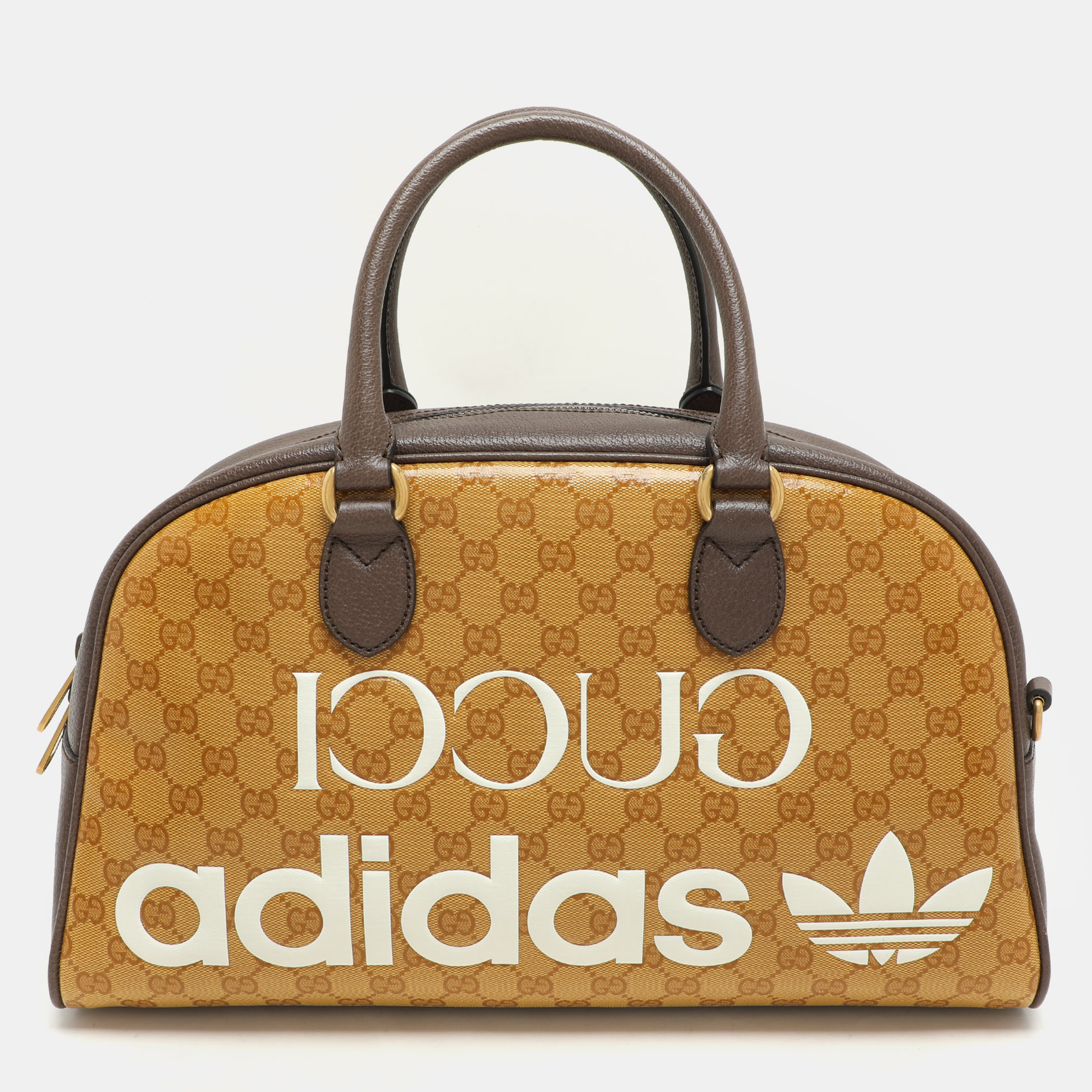 Gucci x Adidas Beige/Brown GG Crystal Canvas and Leather Medium Duffle Bag
Gucci x Adidas Beige/Brown GG Crystal Canvas and Leather Medium Duffle Bag