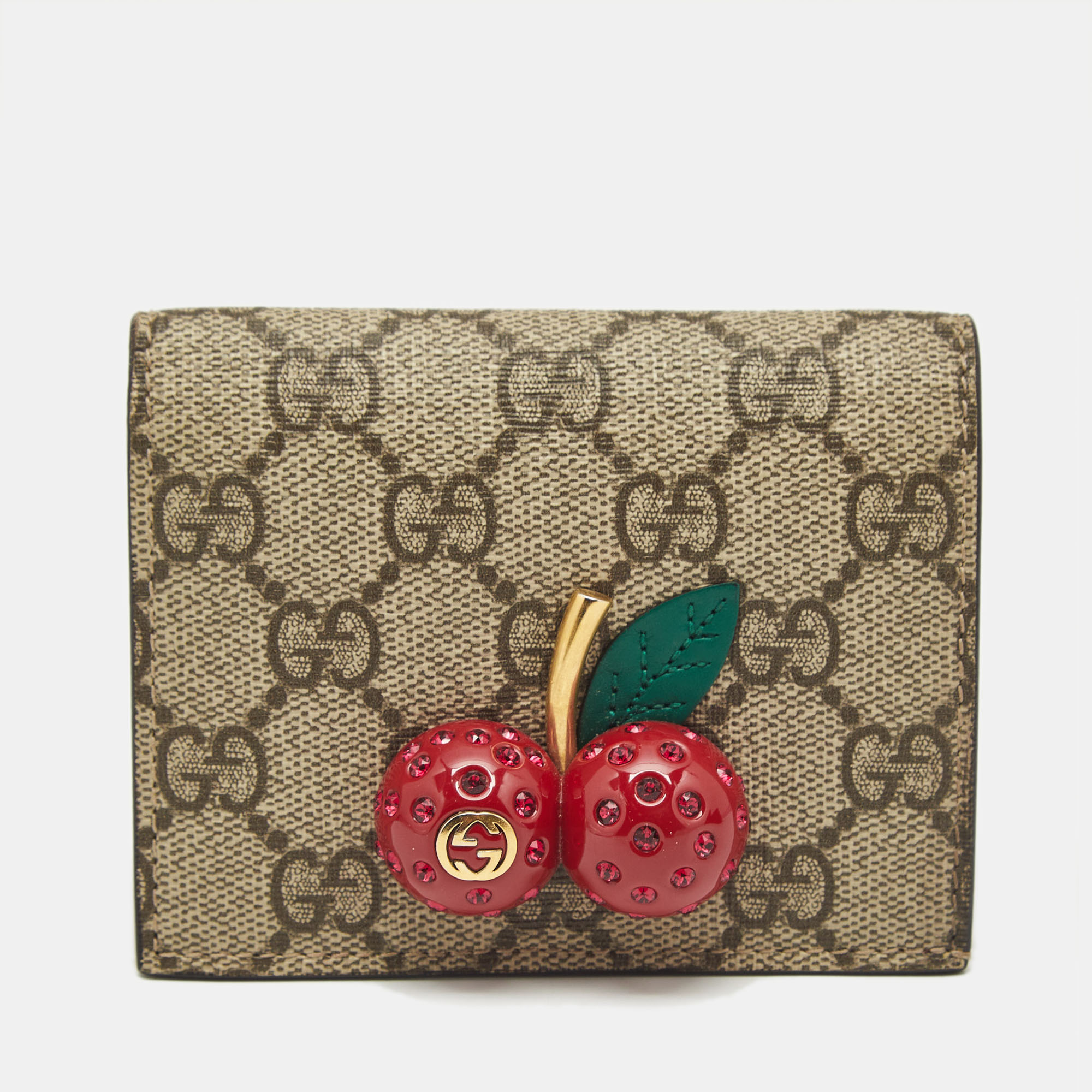Gucci Beige/Red GG Supreme Coated Canvas Cherry Crystals Embellished Card Case
Gucci Beige/Red GG Supreme Coated Canvas Cherry Crystals Embellished Card Case