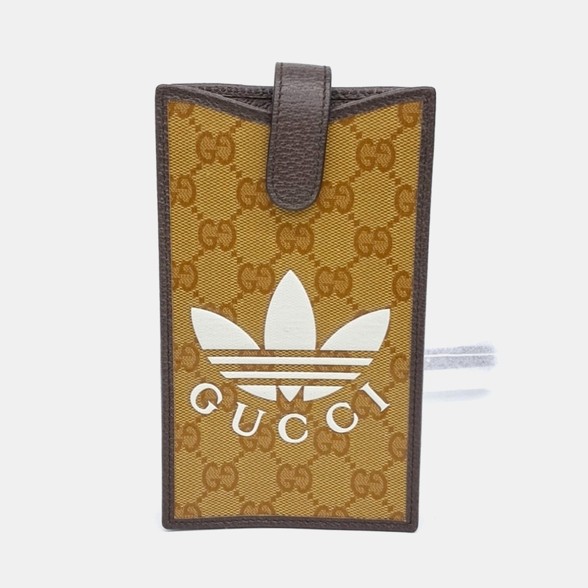 Gucci Beige PVC X Adidas Phone Holder Crossbody Bag
Gucci Beige PVC X Adidas Phone Holder Crossbody Bag