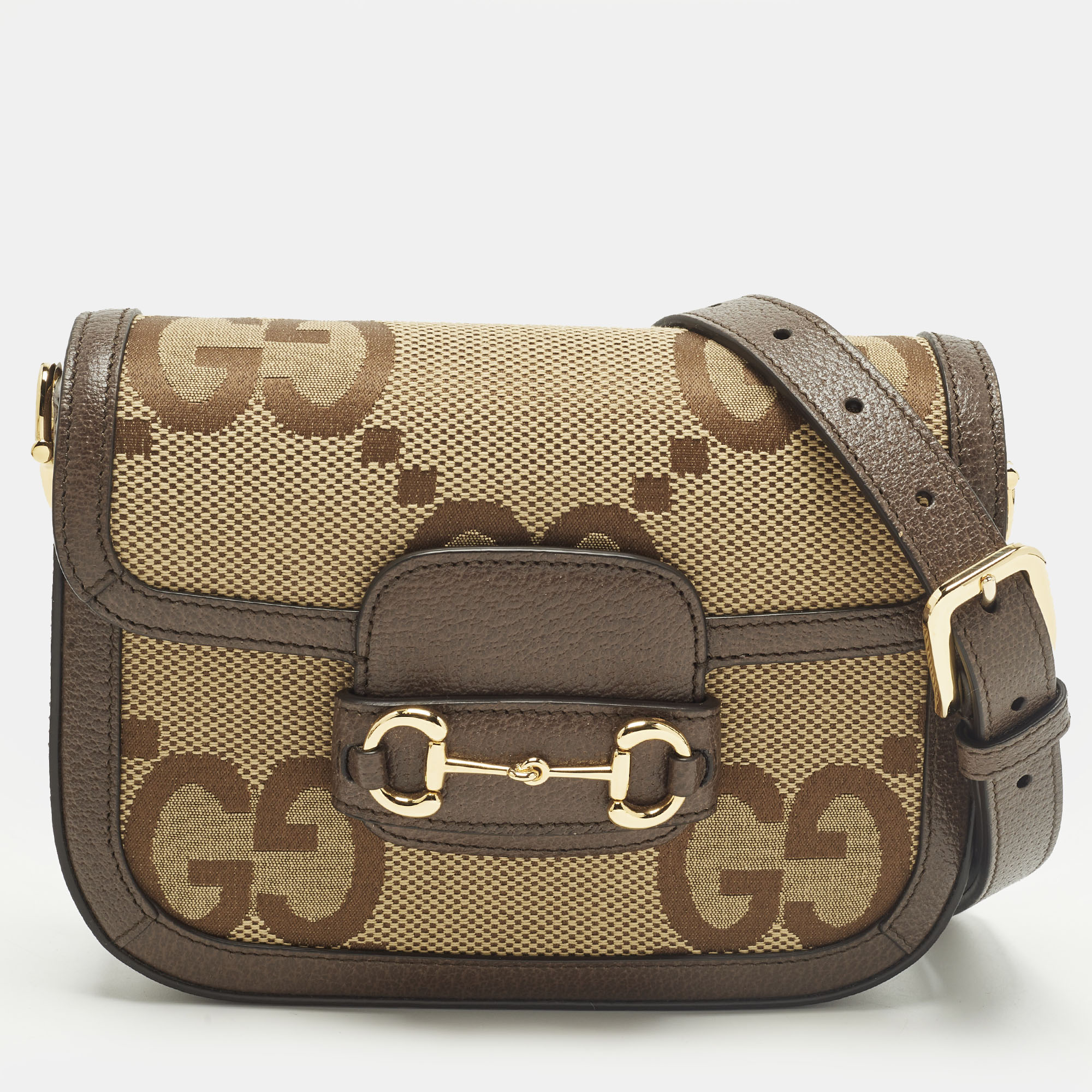 Gucci Horsebit 1955 Mini Brown GG Jumbo Canvas and Leather Crossbody Bag
Gucci Horsebit 1955 Mini Brown GG Jumbo Canvas and Leather Crossbody Bag