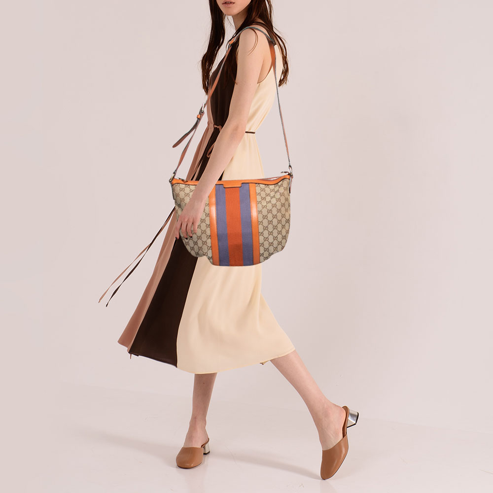 Gucci Beige/Orange GG Canvas and Leather Vintage Web Stripe Shoulder Bag
Gucci Beige/Orange GG Canvas and Leather Vintage Web Stripe Shoulder Bag