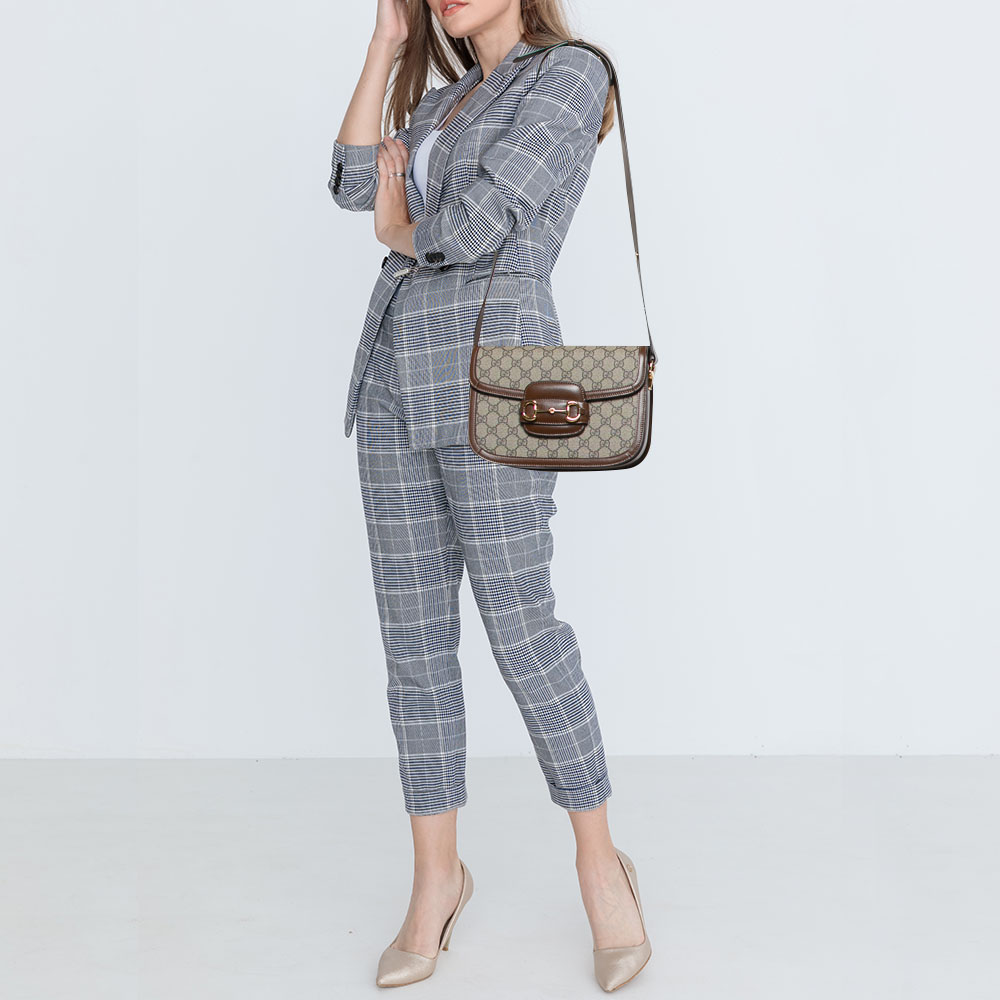 Gucci Beige/Brown GG Supreme Canvas and Leather 1955 Horsebit Shoulder Bag
Gucci Beige/Brown GG Supreme Canvas and Leather 1955 Horsebit Shoulder Bag