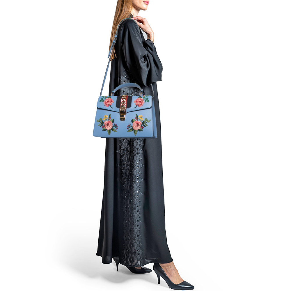 Gucci Light Blue Floral Embroidered Leather Medium Sylvie Top Handle Bag
Gucci Light Blue Floral Embroidered Leather Medium Sylvie Top Handle Bag