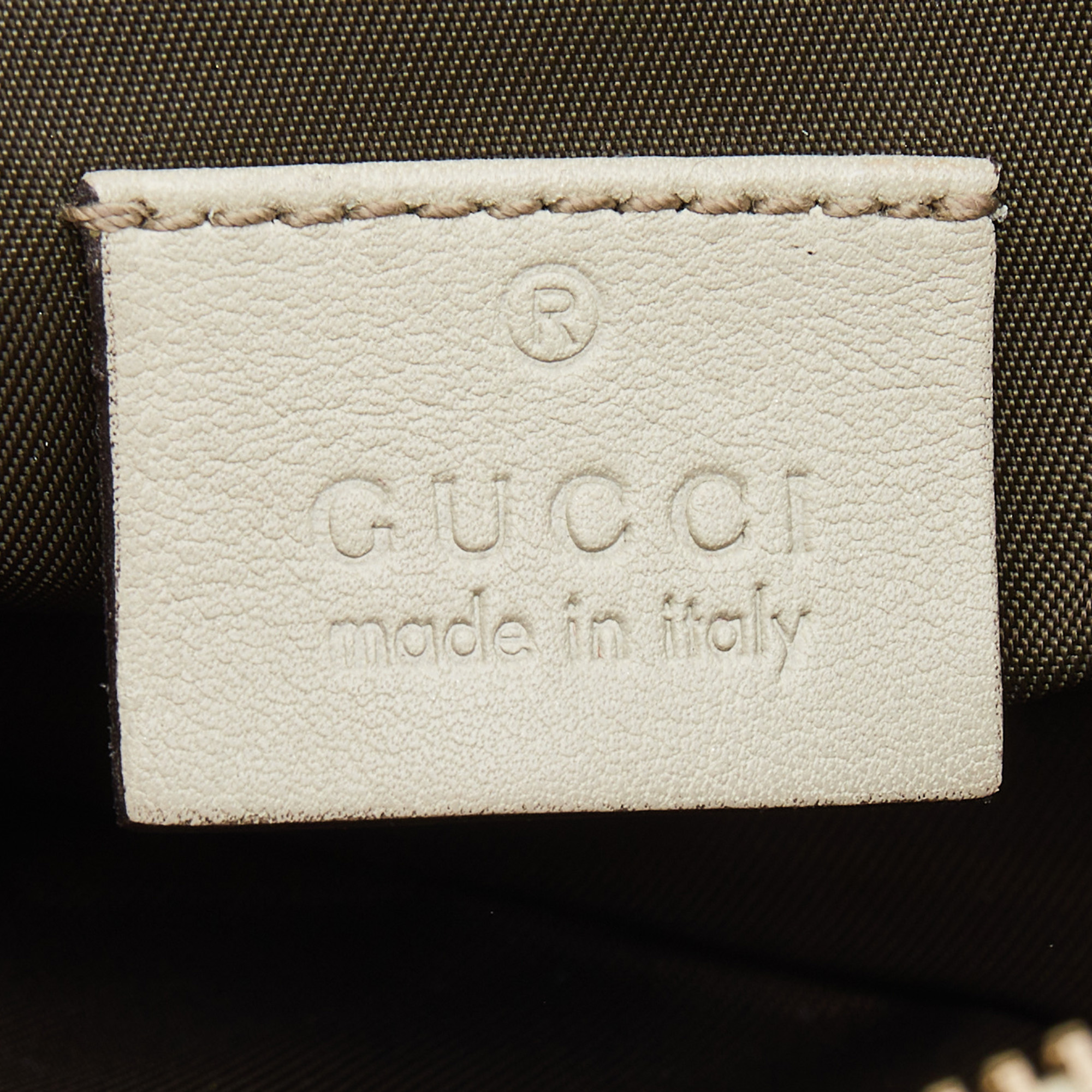 Gucci Off-White Guccissima Leather Interlocking G Wristlet Clutch