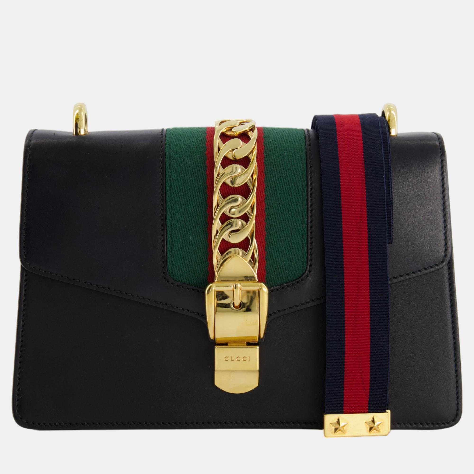 Gucci black leather small sylvie bag canvas with gold hardware and canvas strap