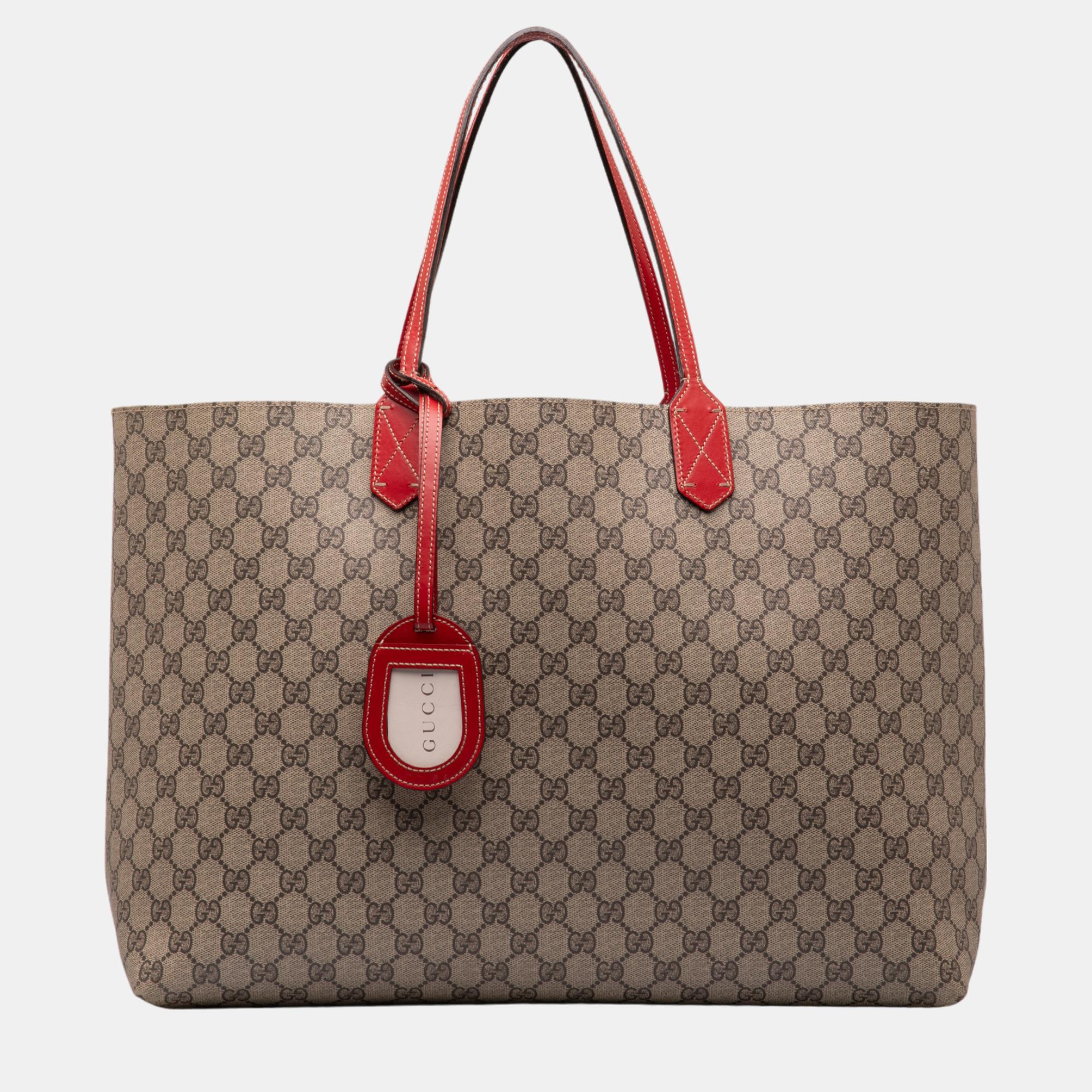 Gucci beige/brown large gg supreme reversible tote bag