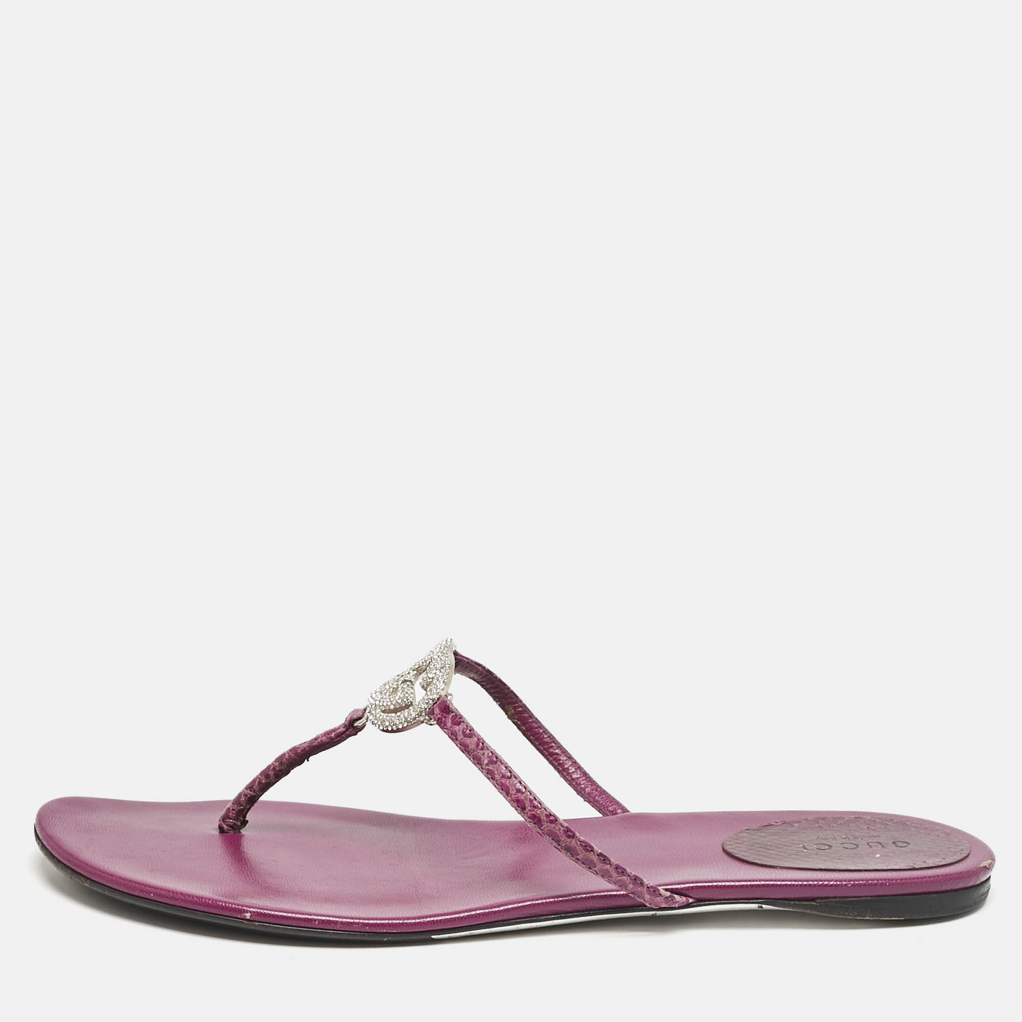 Gucci Purple Leather and Watersnake Interlocking G Crystals Thong Flats Size
Gucci Purple Leather and Watersnake Interlocking G Crystals Thong Flats Size