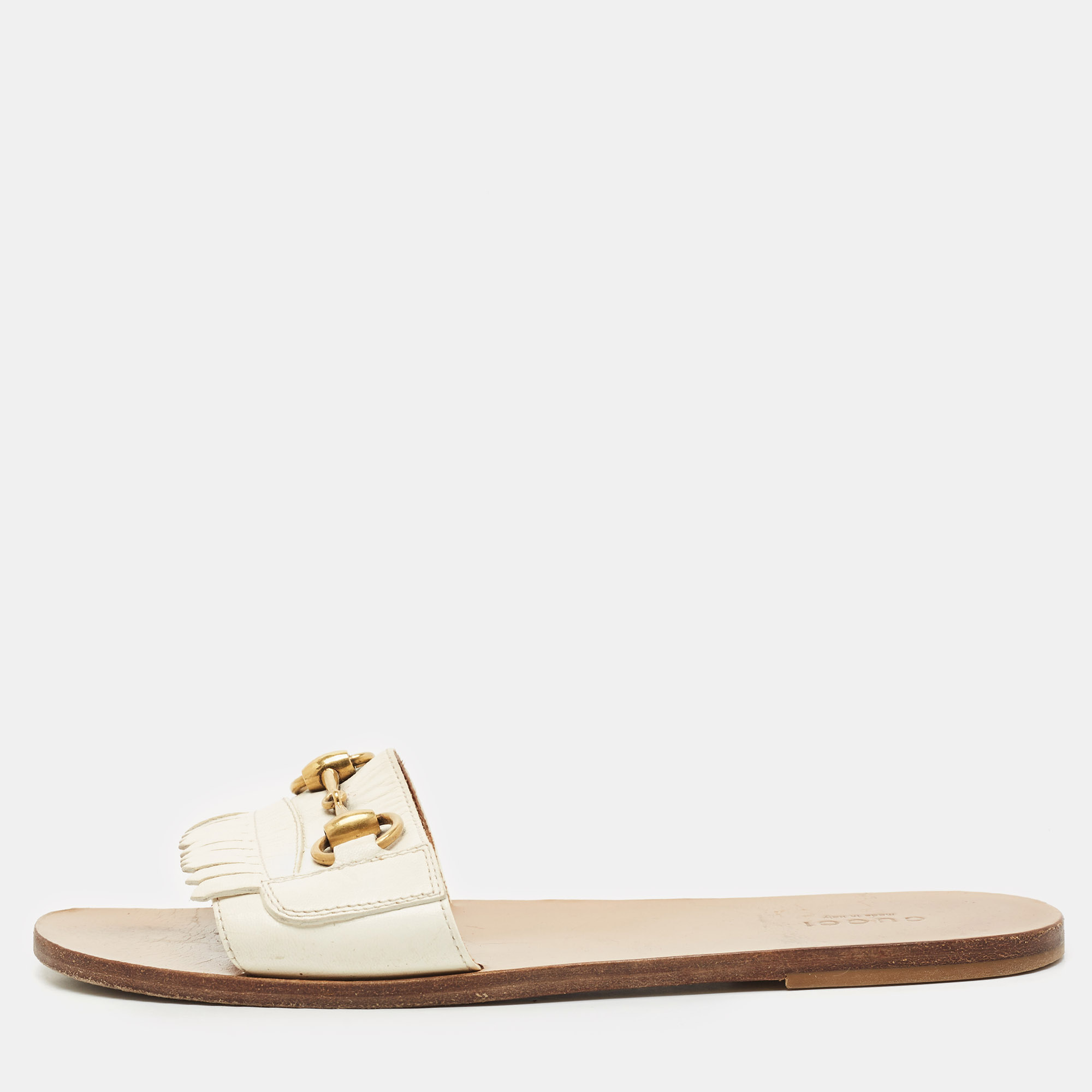 Gucci Off White Leather Horsebit Fringe Detail Flat Slides Size, Cream
Gucci Off White Leather Horsebit Fringe Detail Flat Slides Size, Cream