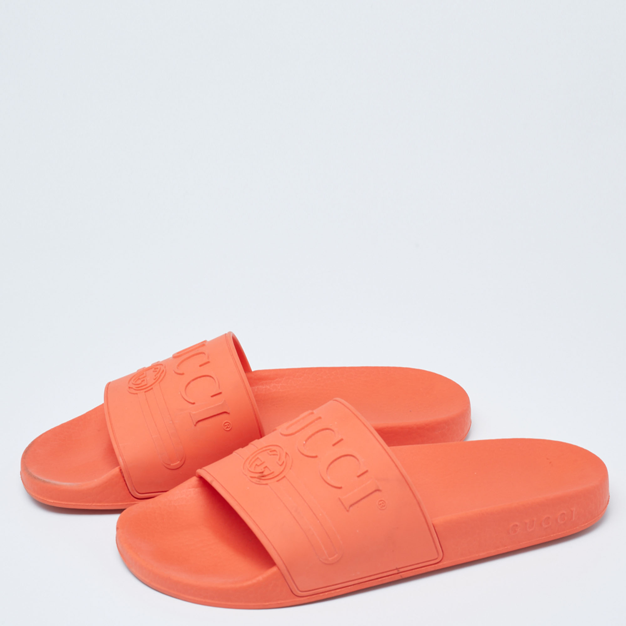 

Gucci Coral Orange Rubber Pursuit Logo Embossed Pool Slides Size
