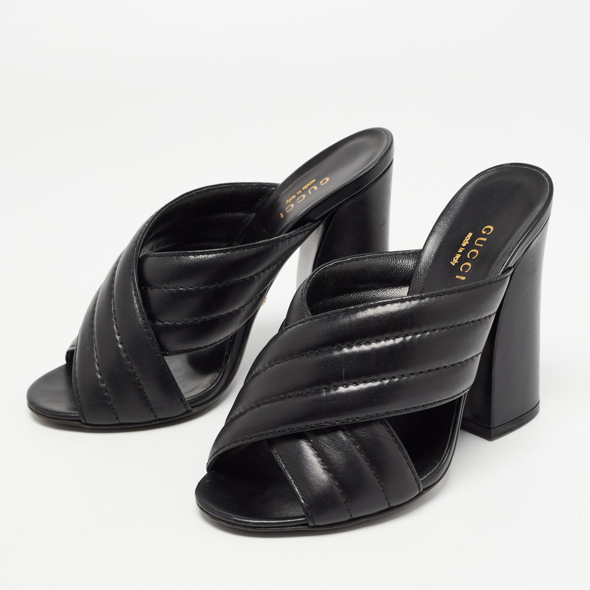 

Gucci Black Quilted Leather Webby Criss Cross Open Toe Mules Size