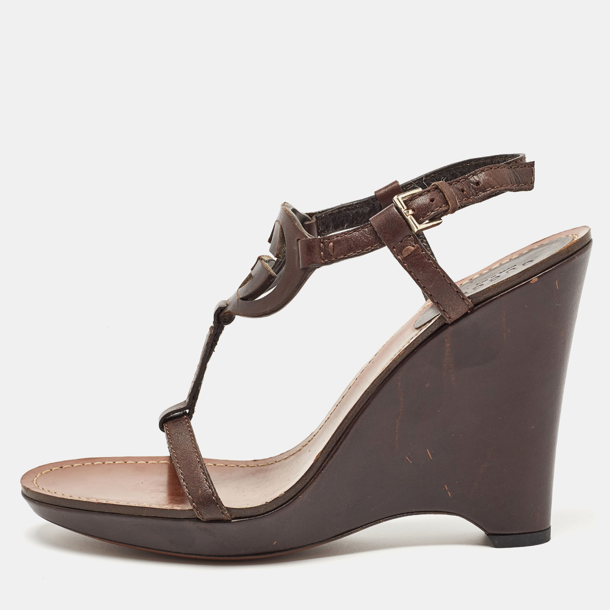 

Gucci Brown Leather Brown GG Wedge Ankle Strap Sandals Size