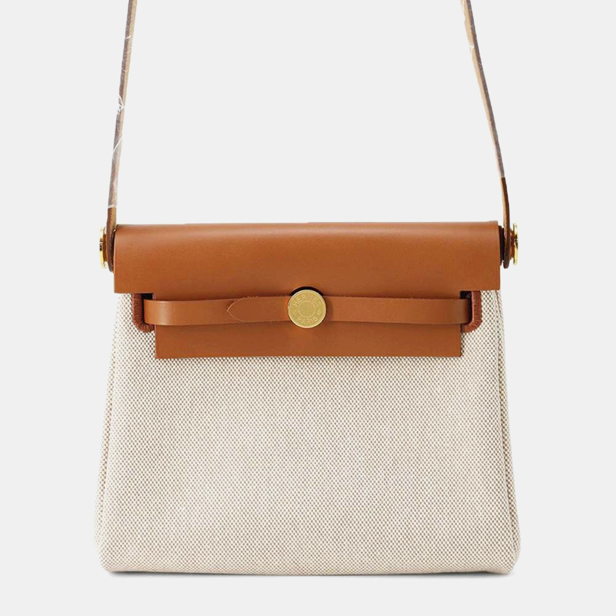 Hermes Ecru/Fauve Toile Military Vache Hunter Leather Herbag Zip Mini, Beige
Hermes Ecru/Fauve Toile Military Vache Hunter Leather Herbag Zip Mini, Beige