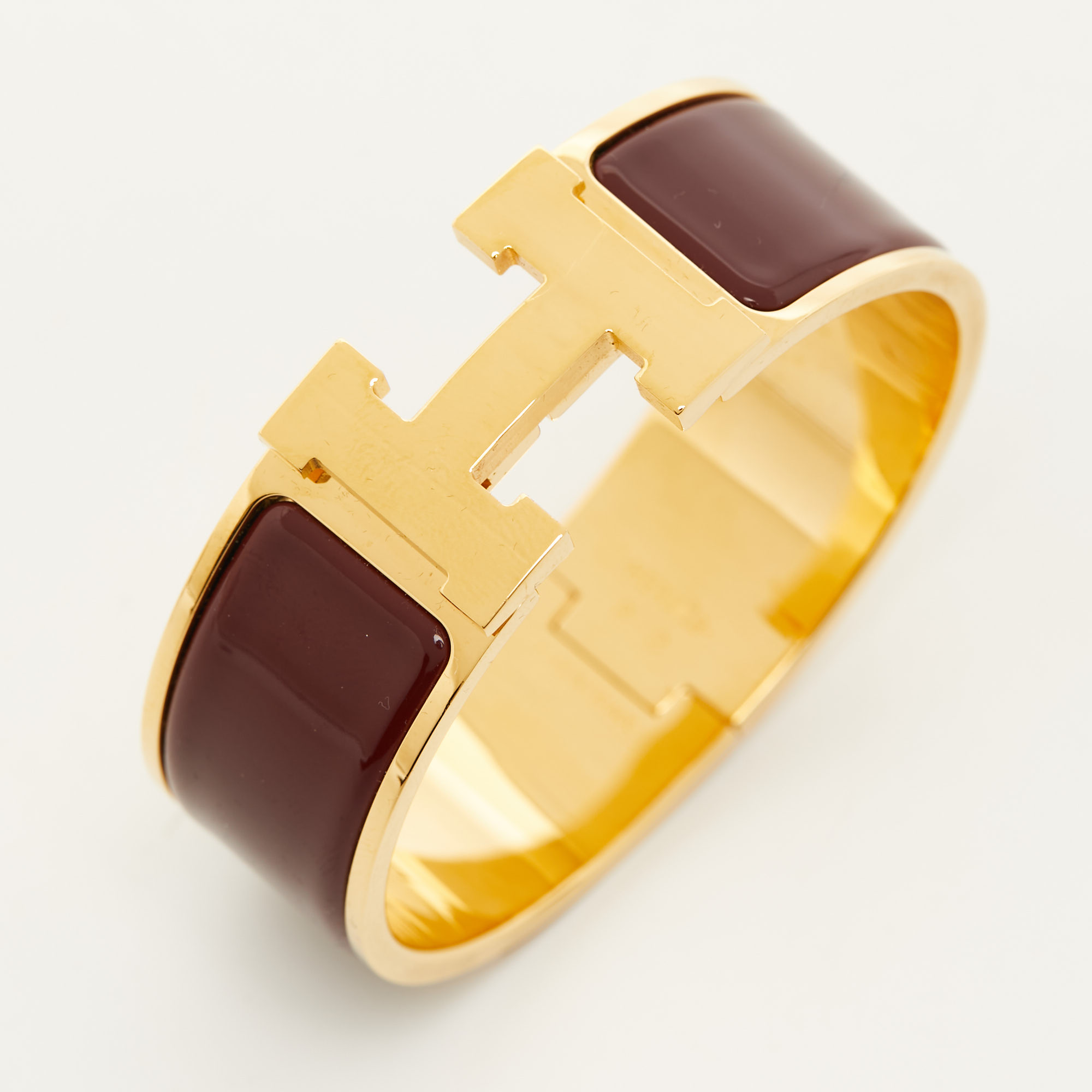 Hermès Clic Clac H Burgandy Enamel Gold Plated Bracelet