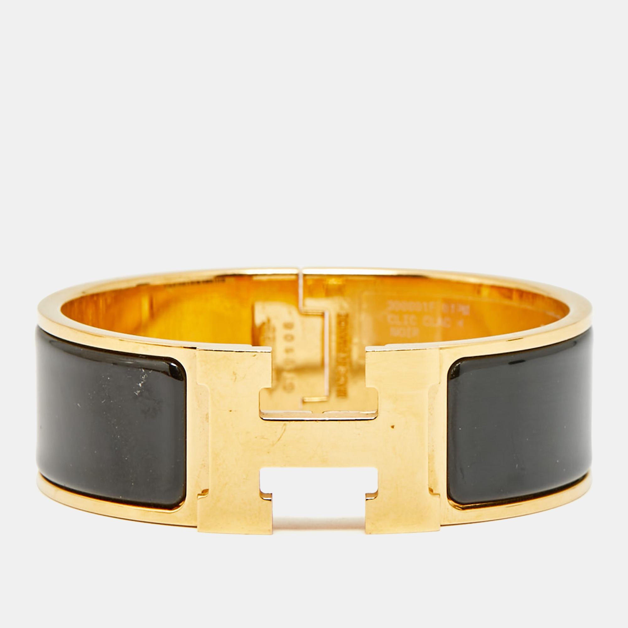Hermes Clic Clac H Black Enamel Gold Plated Bracelet
Hermes Clic Clac H Black Enamel Gold Plated Bracelet