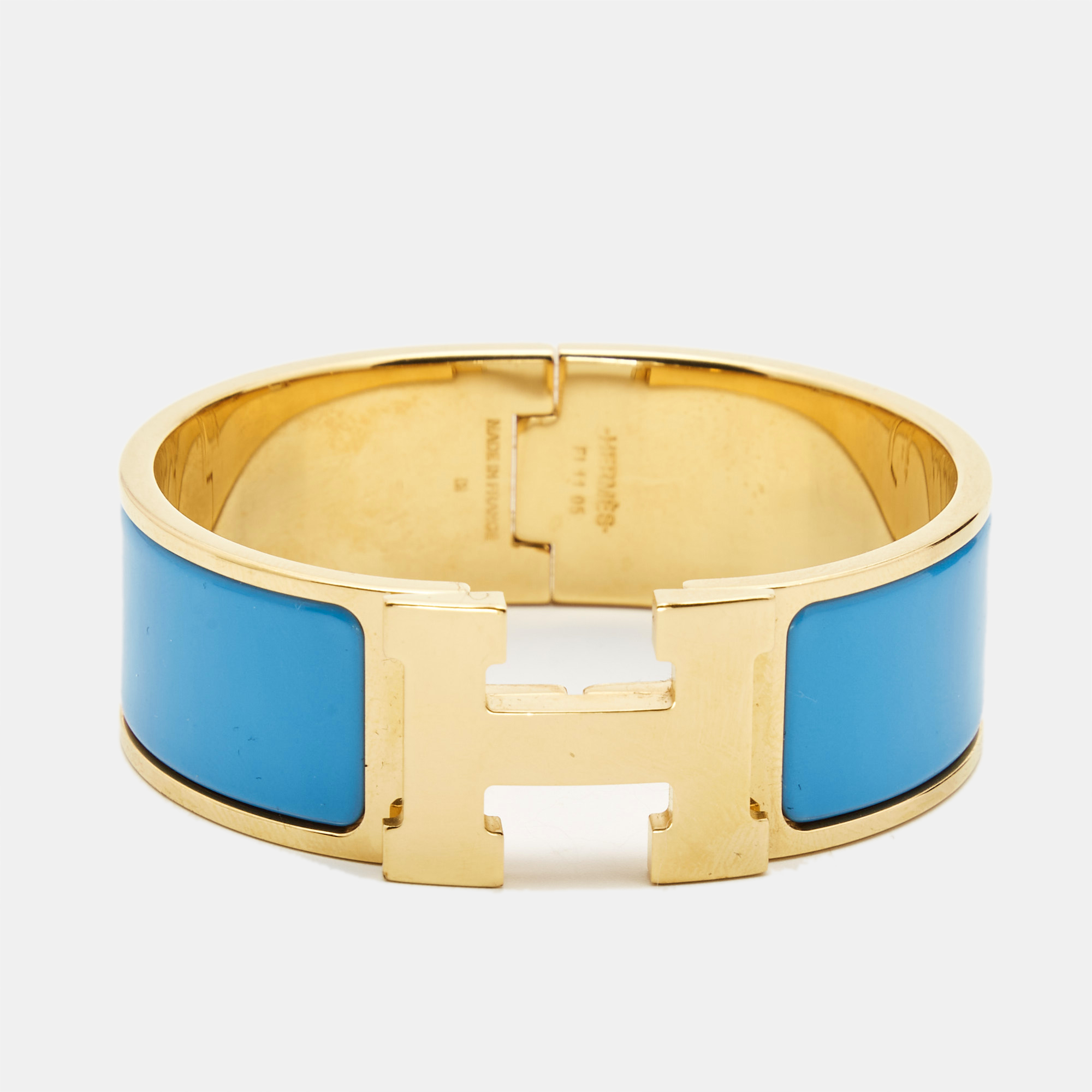 Hermes clic clac h blue enamel gold plated bracelet