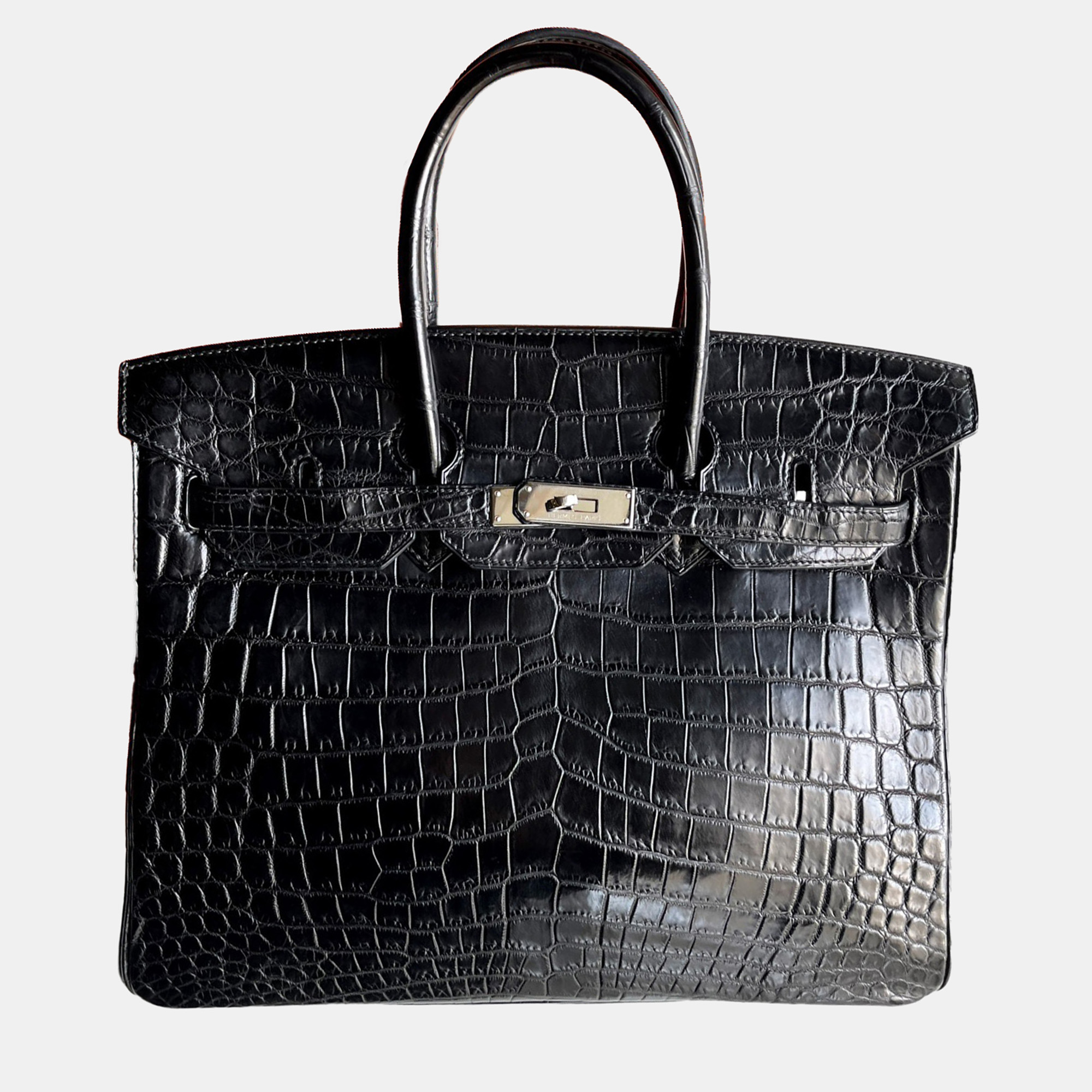 Hermes Black Matte Crocodile Leather Birkin 35 Top Handle Bag
Hermes Black Matte Crocodile Leather Birkin 35 Top Handle Bag