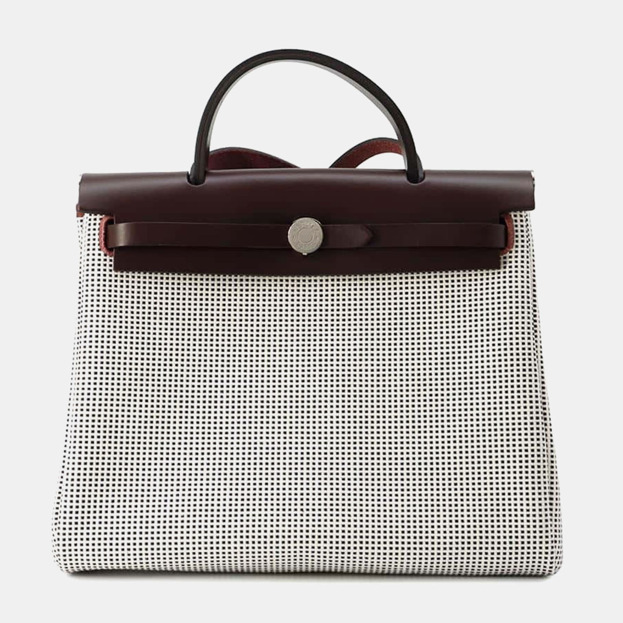 Hermes Rouge sellier/Black/White Toile Quadrille Vache Hunter Leather Herbag Zip 31 (PM)
Hermes Rouge sellier/Black/White Toile Quadrille Vache Hunter Leather Herbag Zip 31 (PM)