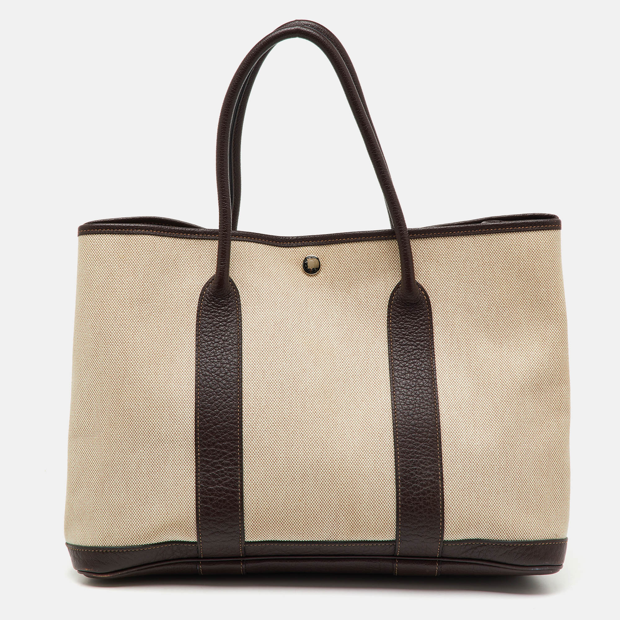 Hermès Natural/Ebene Toile Canvas and Negonda Leather Garden Party 36 Bag, Beige
Hermès Natural/Ebene Toile Canvas and Negonda Leather Garden Party 36 Bag, Beige