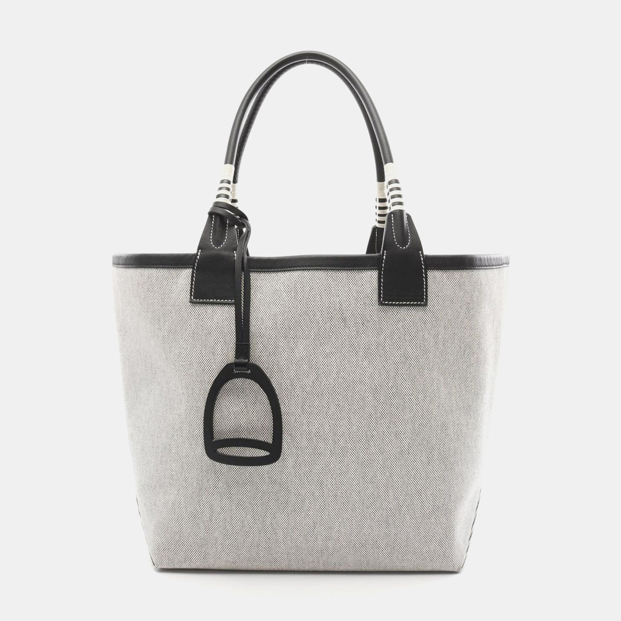Hermes Black Ecru Toile H Canvas Swift Leather Steeple 28 Tote Bag
Hermes Black Ecru Toile H Canvas Swift Leather Steeple 28 Tote Bag