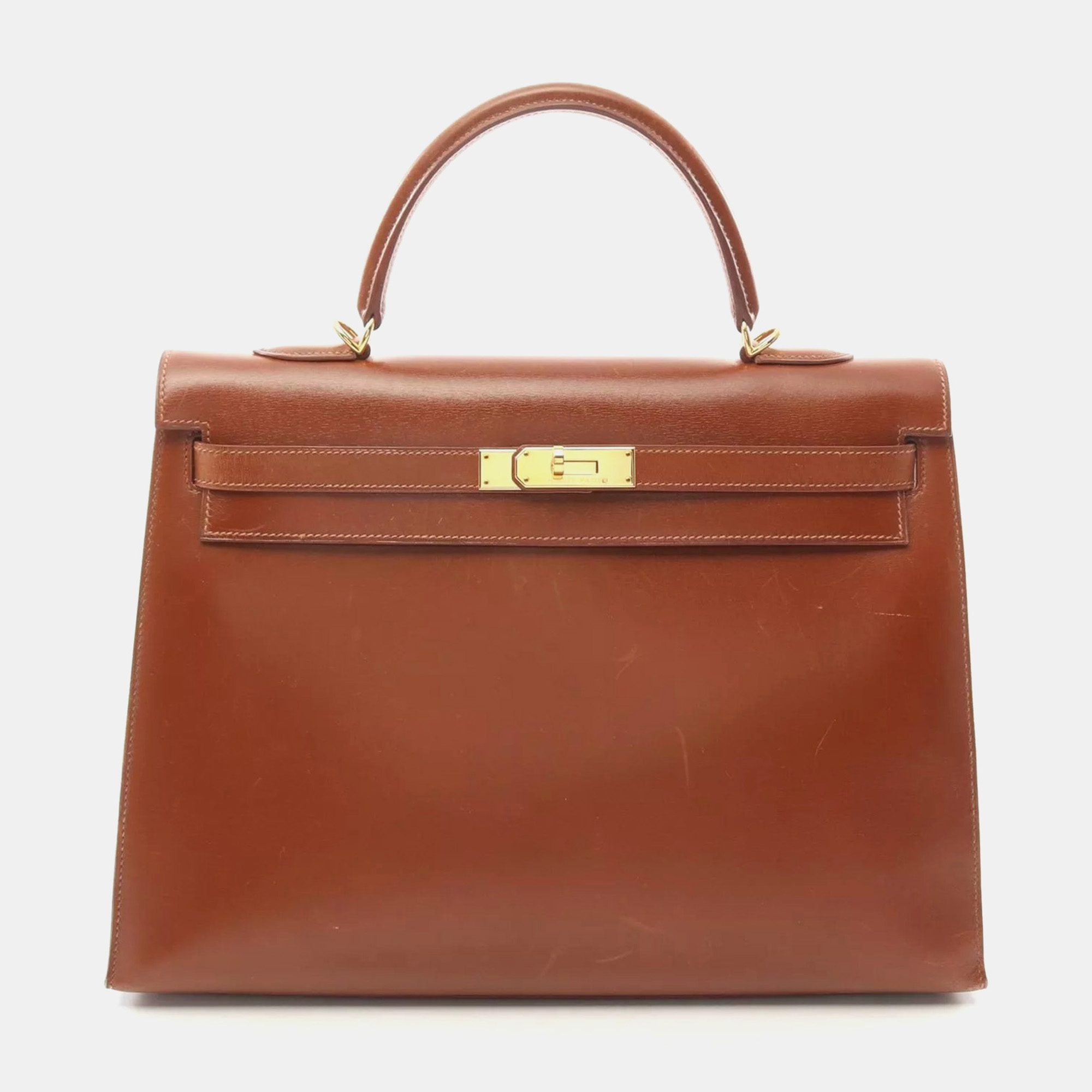 Hermes Box Calf Leather Noisette Kelly 35 Shoulder Bag GHW, Brown
Hermes Box Calf Leather Noisette Kelly 35 Shoulder Bag GHW, Brown