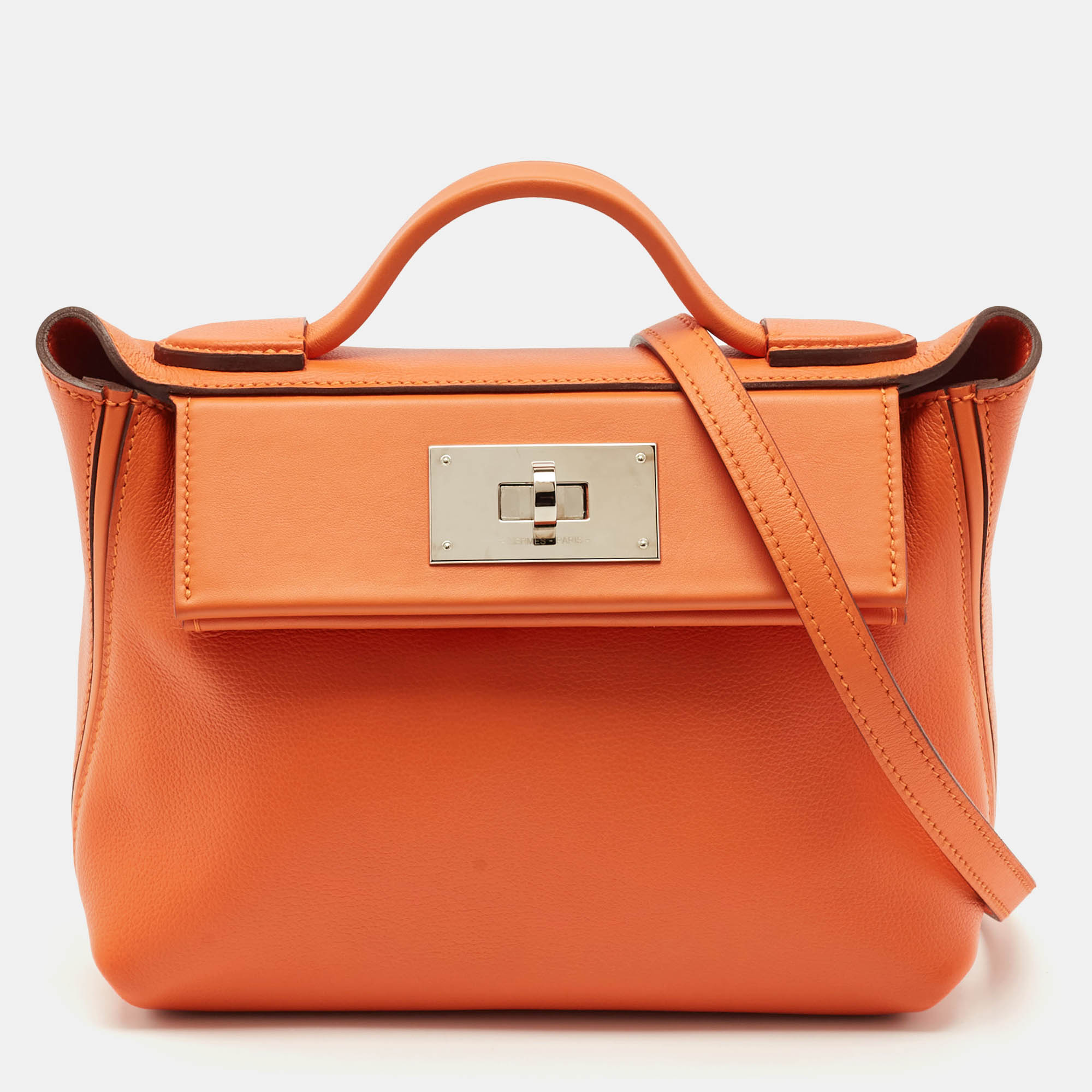 Hermès Orange Evercolor and Swift Leather Silver Finish 24/24 21 Bag
Hermès Orange Evercolor and Swift Leather Silver Finish 24/24 21 Bag