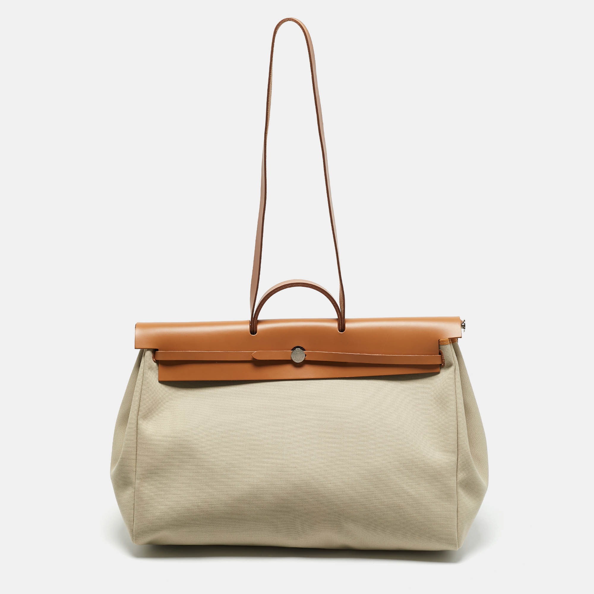 Hermes Ecru/Beige /Naturel Sable Canvas and Leather Herbag Zip Cabine Bag, Tan
Hermes Ecru/Beige /Naturel Sable Canvas and Leather Herbag Zip Cabine Bag, Tan