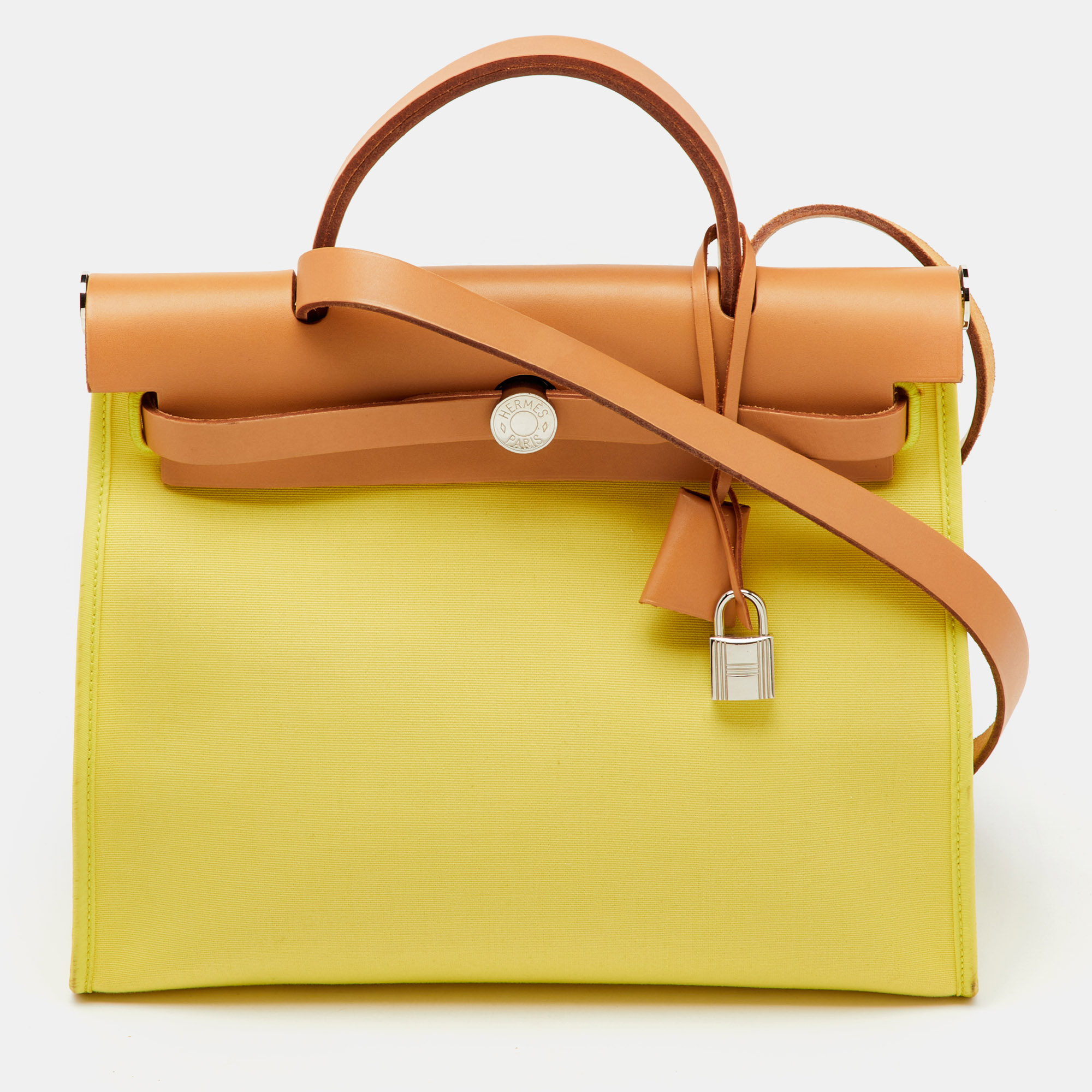Hermes Soufre/Natural Toile Canvas and Vache Leather Herbag Zip 31 Bag, Yellow
Hermes Soufre/Natural Toile Canvas and Vache Leather Herbag Zip 31 Bag, Yellow