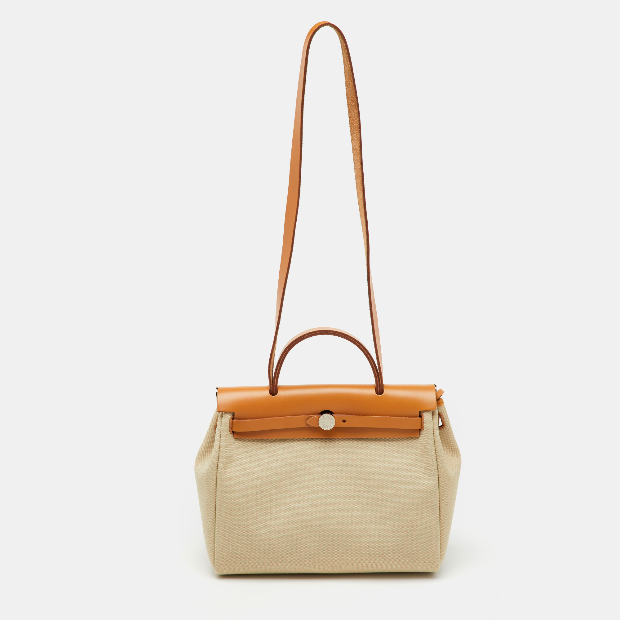 Hermes Ecru/Natural Toile Canvas and Vache Leather Herbag Zip 31 Bag, Beige
Hermes Ecru/Natural Toile Canvas and Vache Leather Herbag Zip 31 Bag, Beige