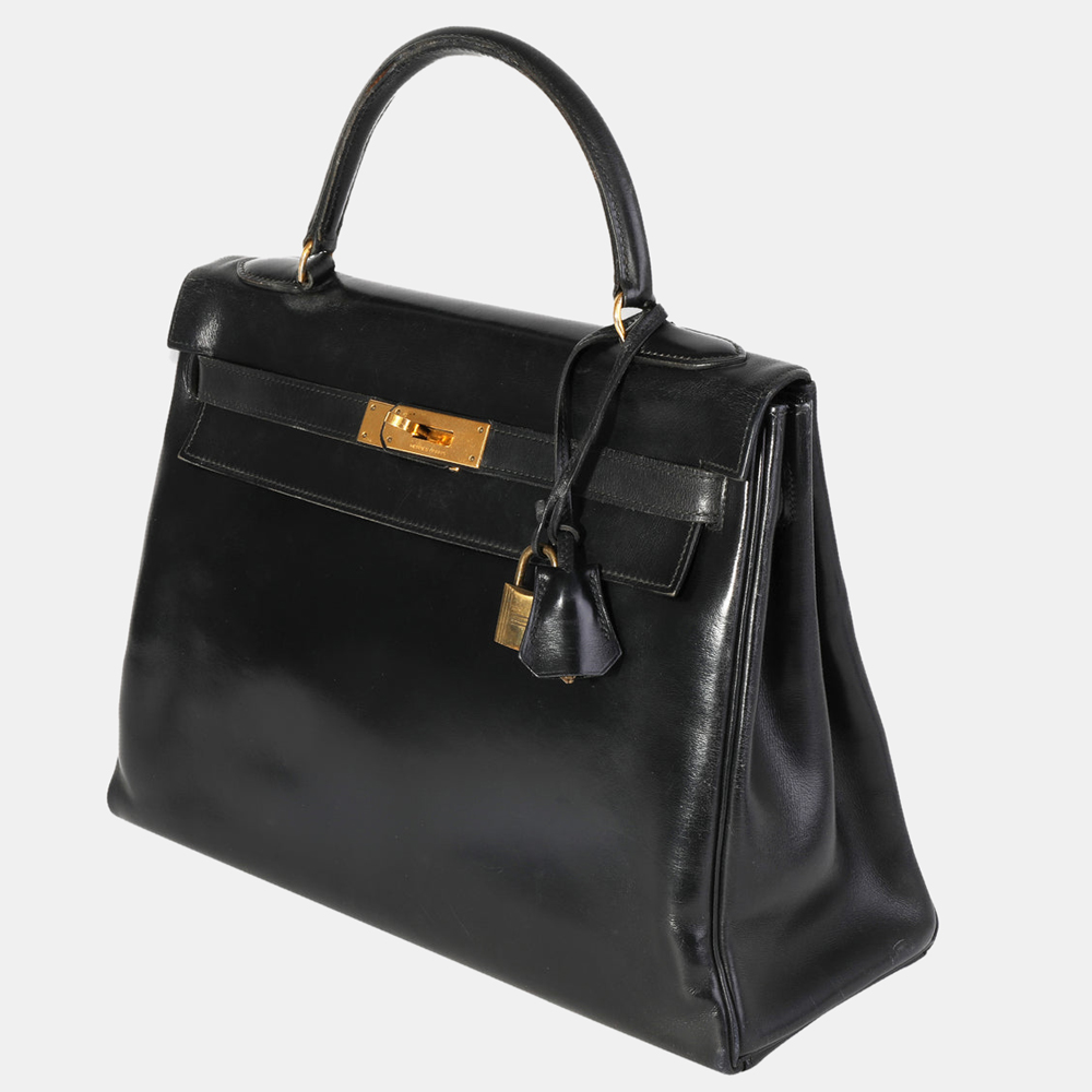 Hermes Black Box Calf Leather Vintage Retourne Kelly 32 GHW Bag
Hermes Black Box Calf Leather Vintage Retourne Kelly 32 GHW Bag