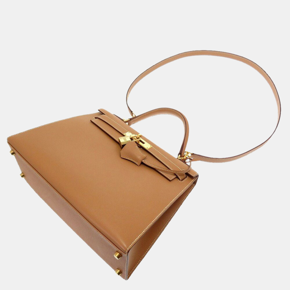 Hermes Kelly 28 Outer sewing Kushvel Natural V metal fittings New D stamp Handbag Bag Brown
Hermes Kelly 28 Outer sewing Kushvel Natural V metal fittings New D stamp Handbag Bag Brown