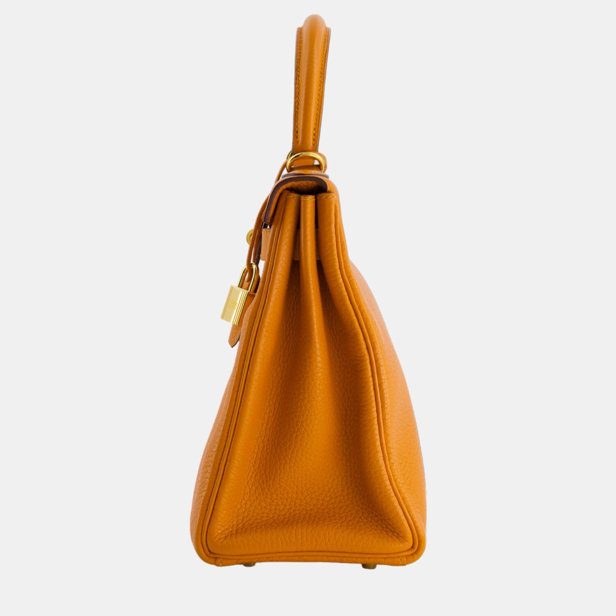 Hermes Kelly Bag in Abricot Clemence Leather with Gold Hardware, Orange
Hermes Kelly Bag in Abricot Clemence Leather with Gold Hardware, Orange