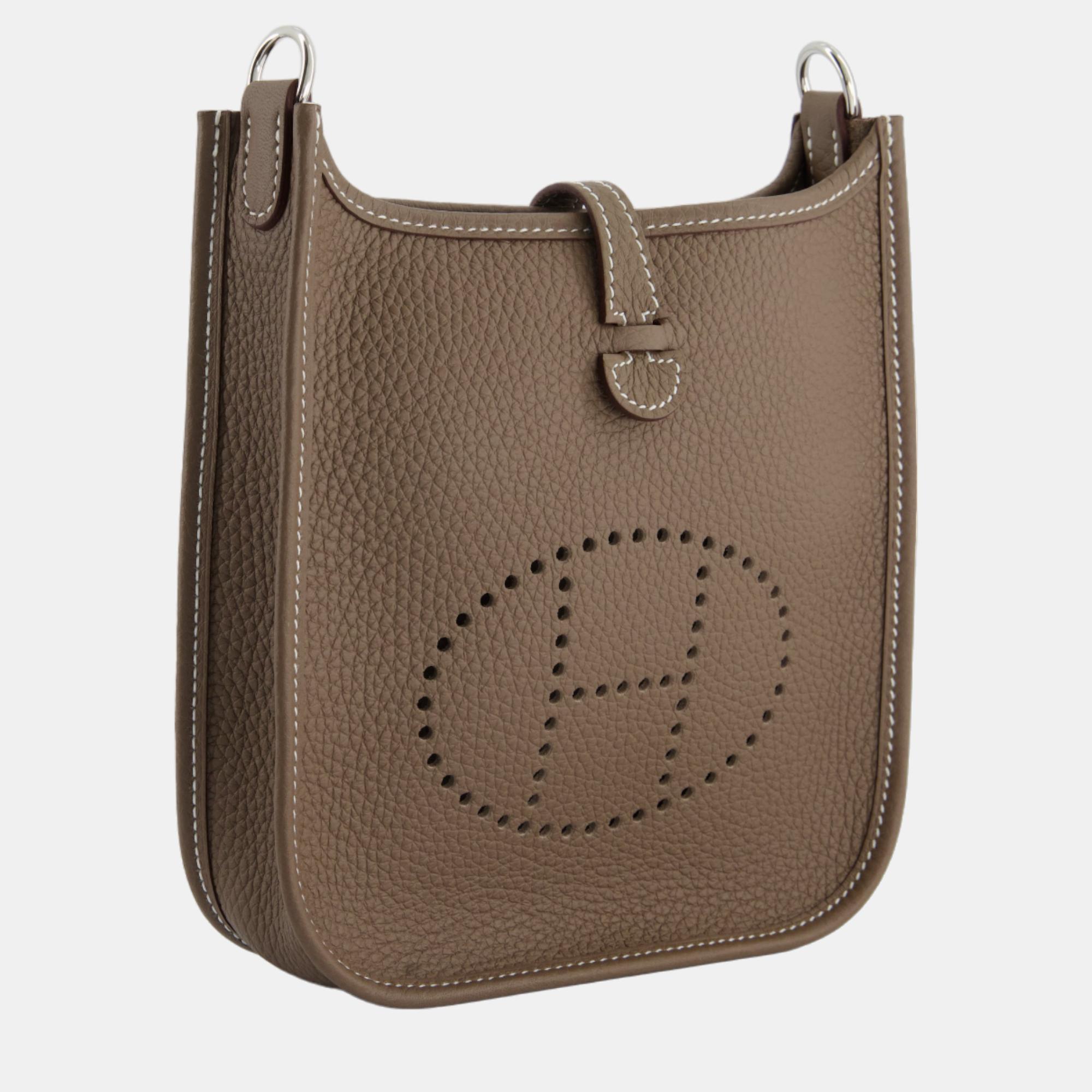 Hermes Mini Evelyne in Etoupe Clemence Leather with Palladium Hardware and Blue Indigo Strap, Grey
Hermes Mini Evelyne in Etoupe Clemence Leather with Palladium Hardware and Blue Indigo Strap, Grey