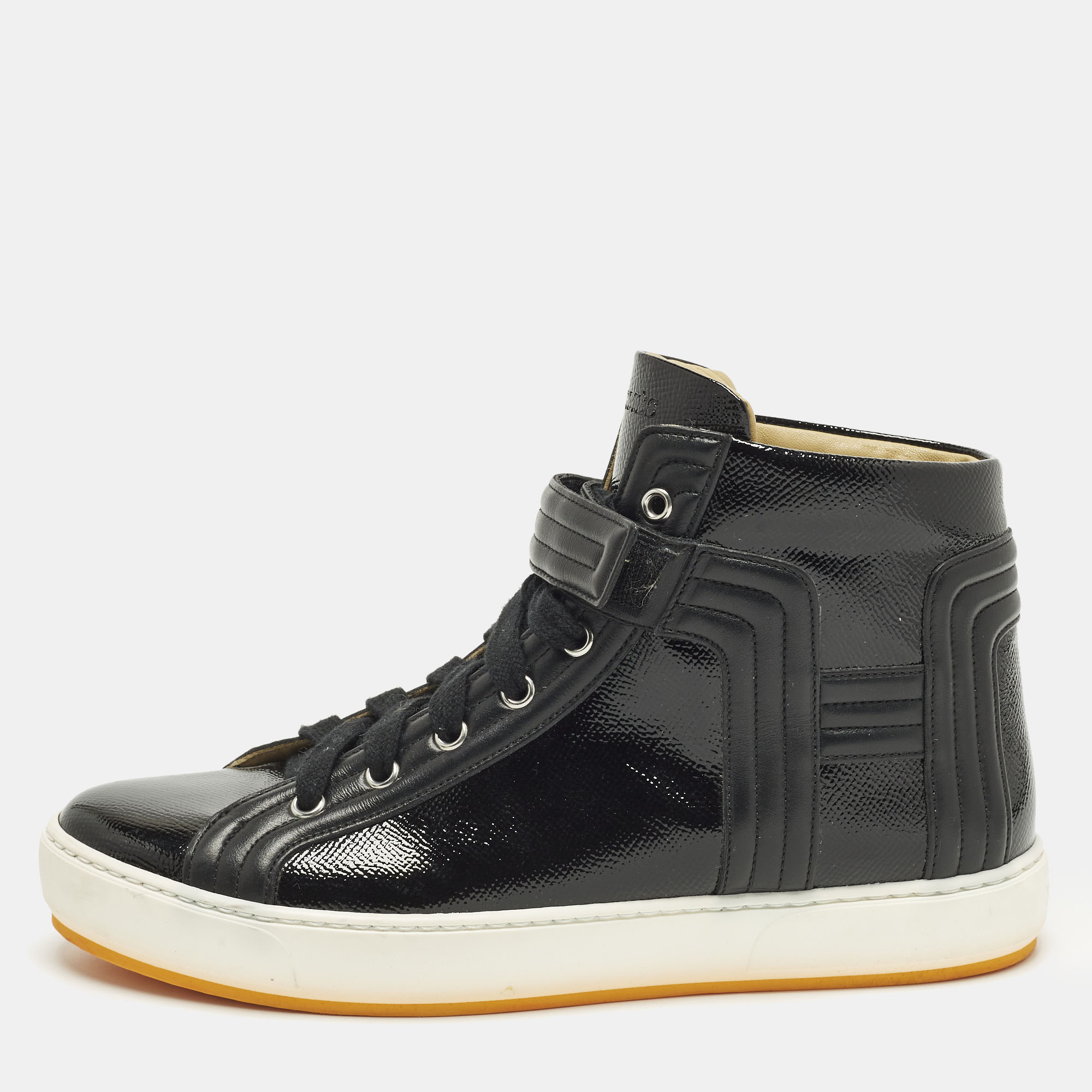 Hermes Lions Size Black Leather and Patent Leather High Top Sneakers
Hermes Lions Size Black Leather and Patent Leather High Top Sneakers