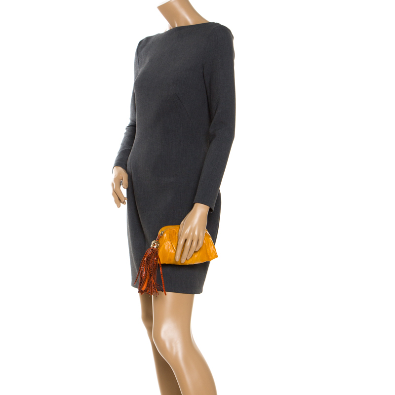 Jimmy Choo Orange Leather Tassel Clutch
Jimmy Choo Orange Leather Tassel Clutch