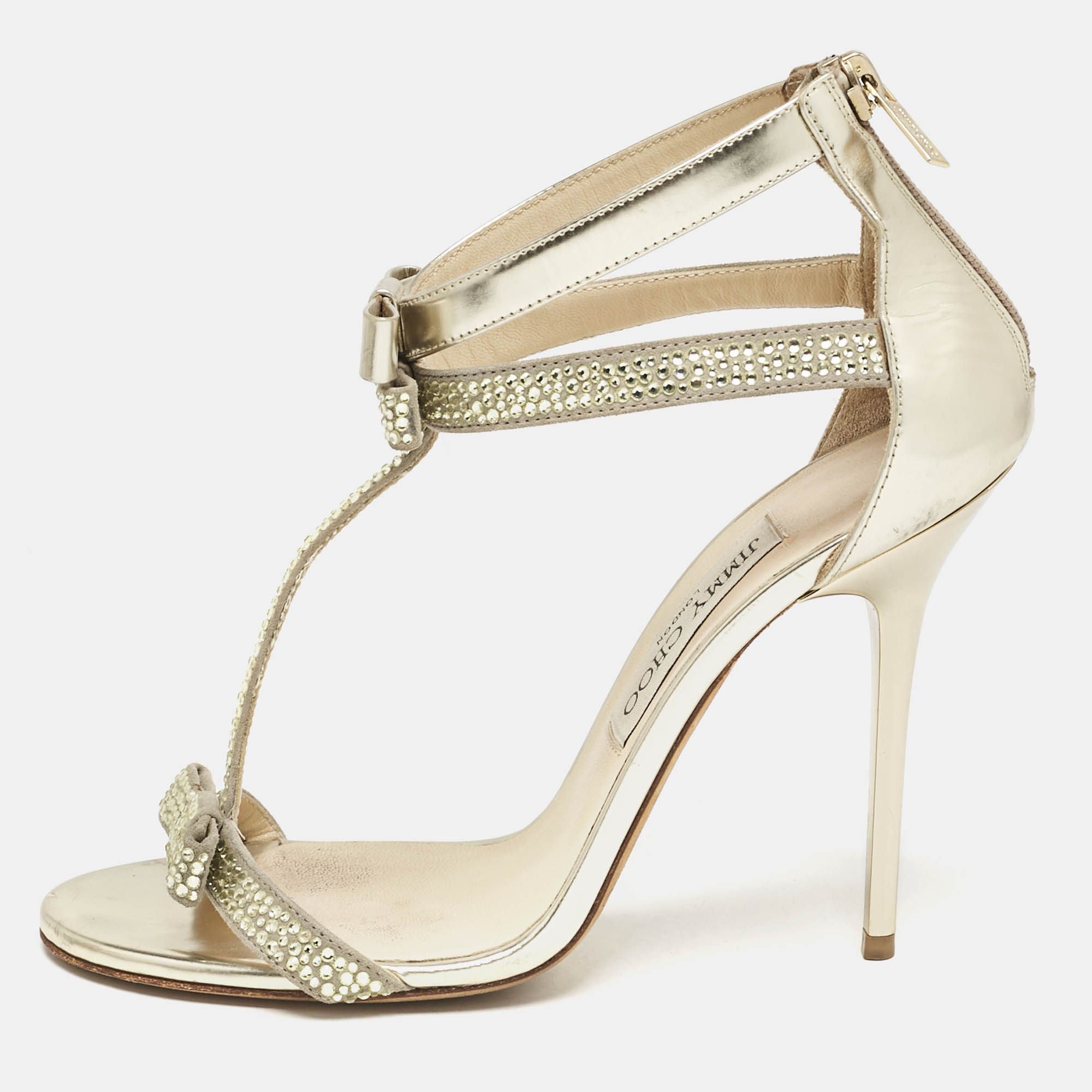 Jimmy Choo Gold Leather and Suede Crystal Embellished Escape T-Strap Sandals Size
Jimmy Choo Gold Leather and Suede Crystal Embellished Escape T-Strap Sandals Size