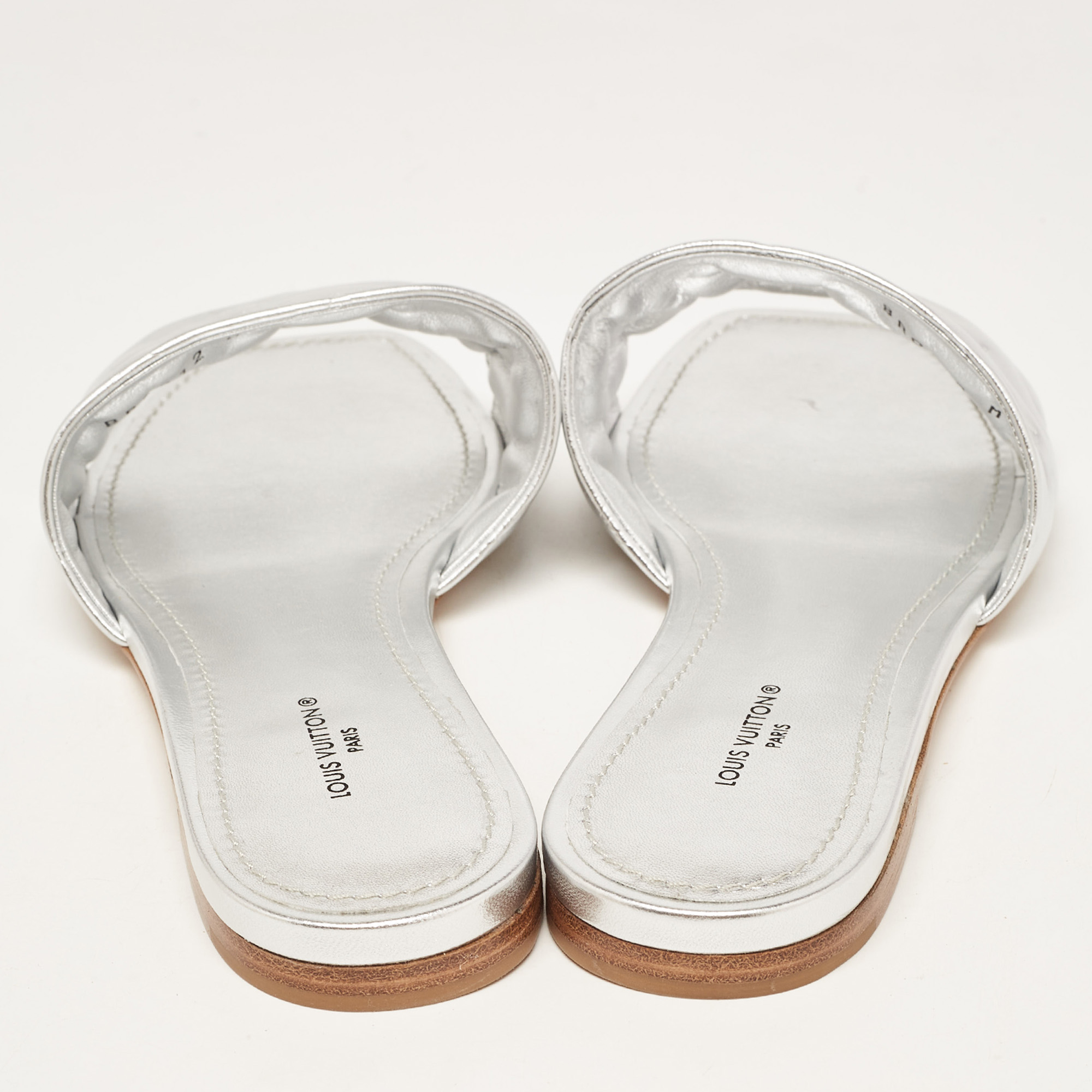Louis Vuitton Silver Monogram Embossed Leather Revival Flat Slides Size 38