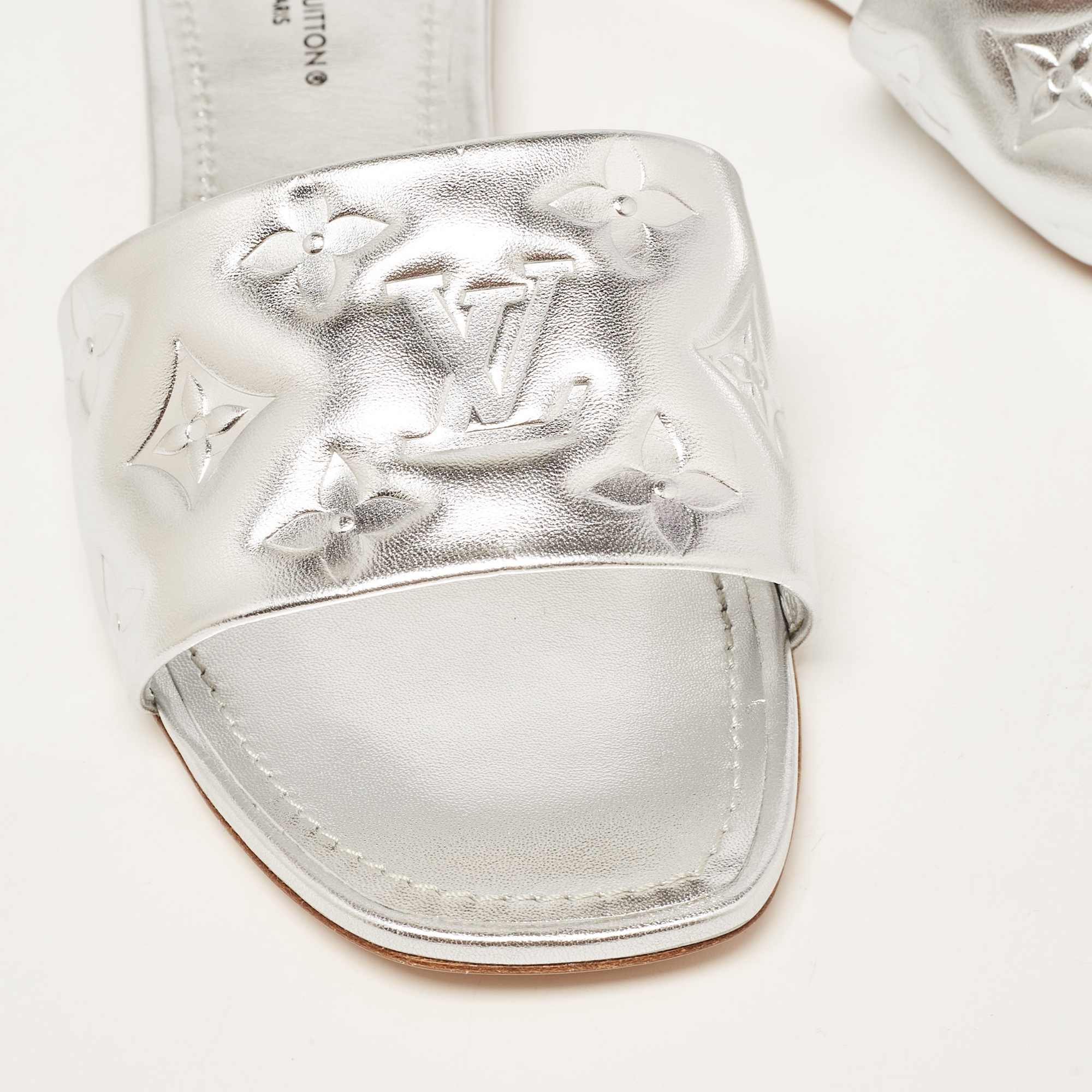 Louis Vuitton Silver Monogram Embossed Leather Revival Flat Slides Size 37