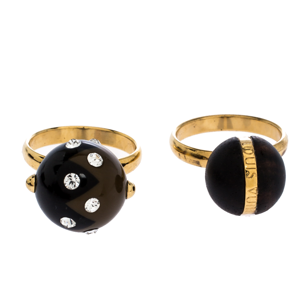 Louis Vuitton Enamel Crystal & Wooden Ball Gold Tone Set of Two Rings
Louis Vuitton Enamel Crystal & Wooden Ball Gold Tone Set of Two Rings