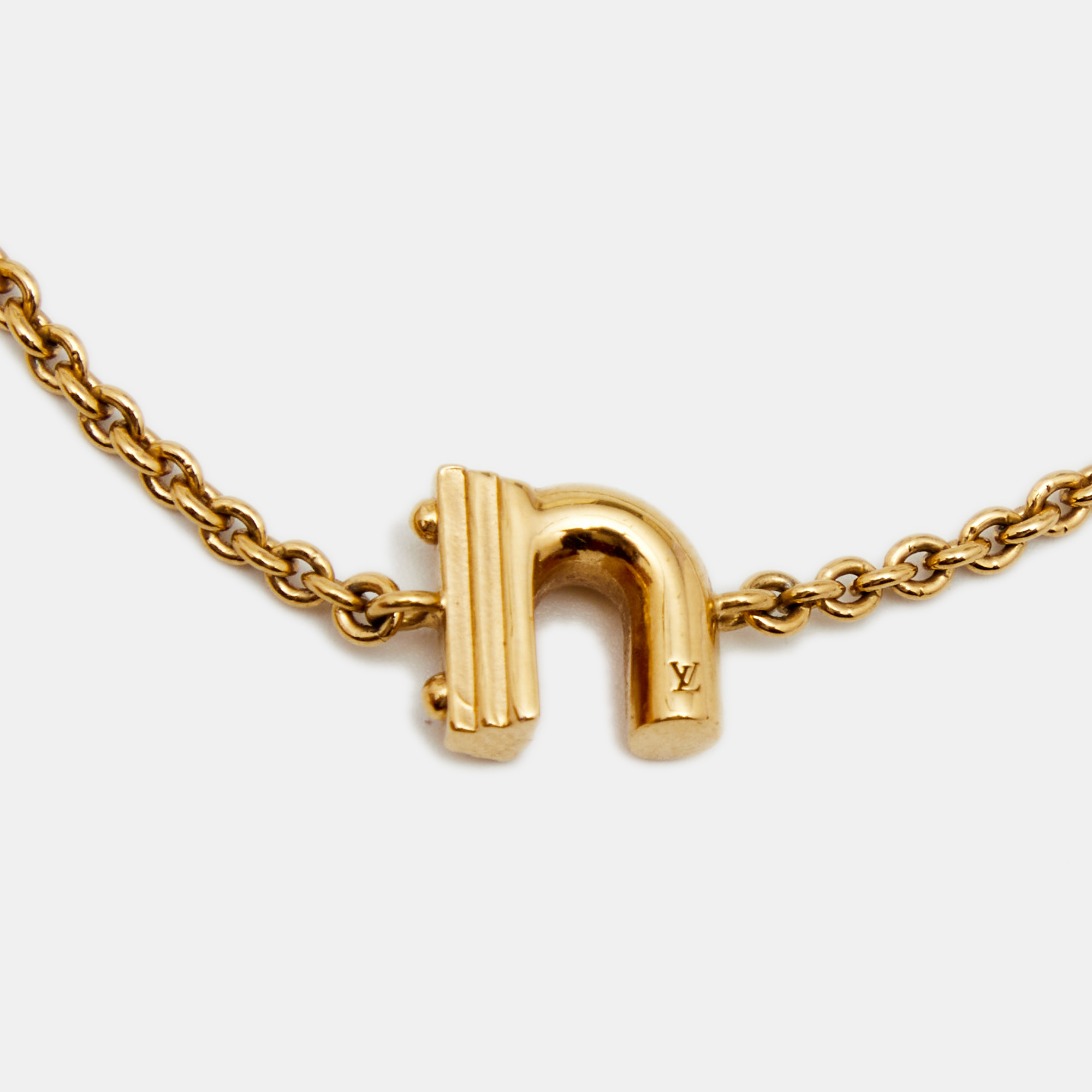 

Louis Vuitton LV & Me Letter N Gold Tone Bracelet