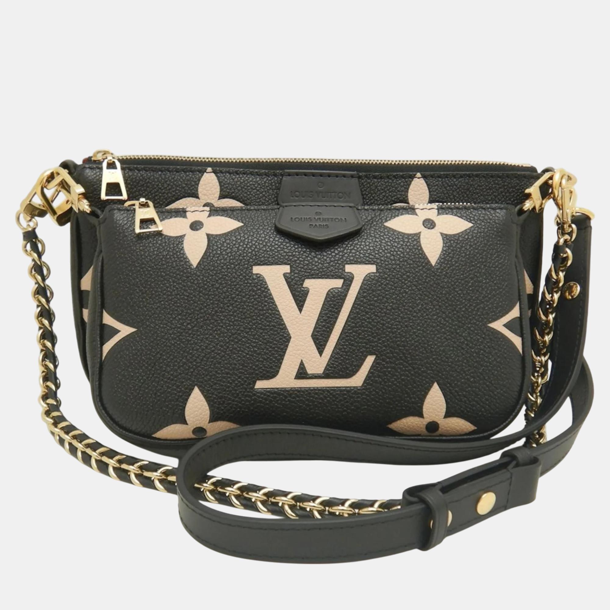 Louis Vuitton Black Cream Bicolor Monogram Empreinte Multi Pochette Shoulder Bag
Louis Vuitton Black Cream Bicolor Monogram Empreinte Multi Pochette Shoulder Bag