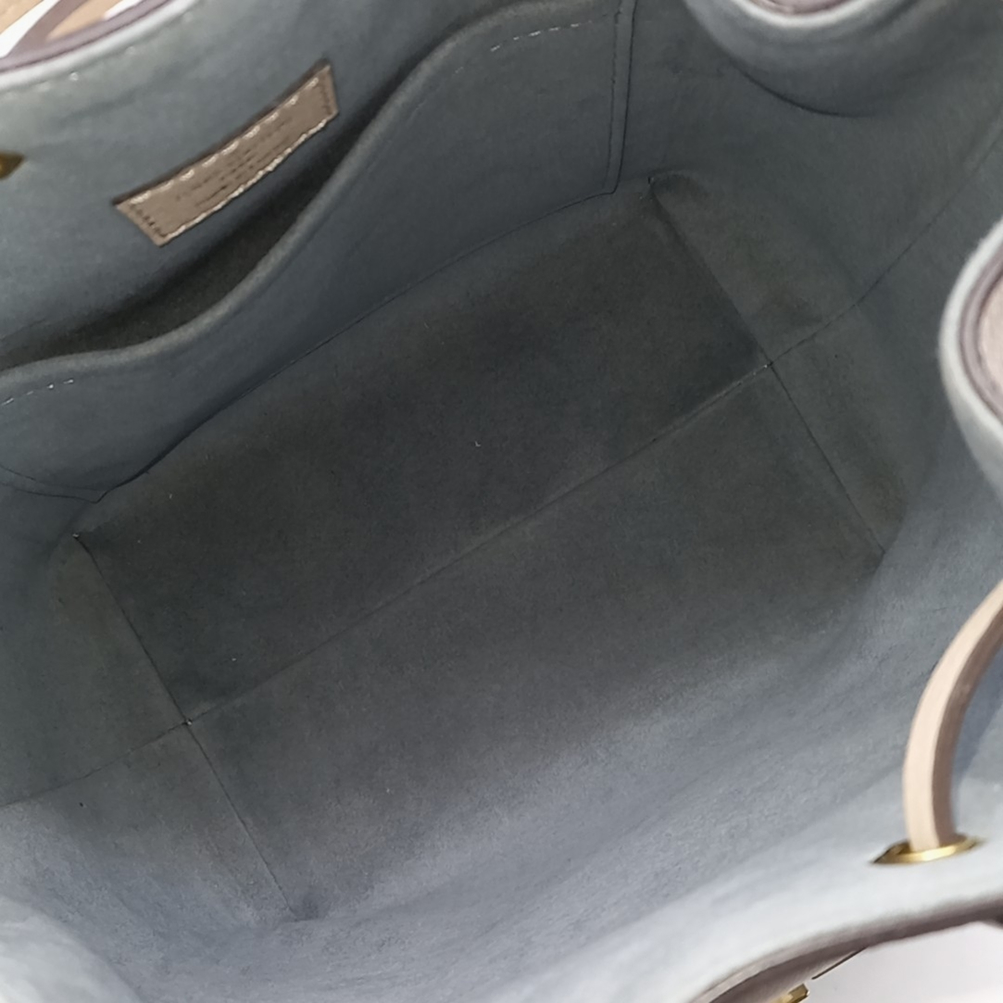 Louis Vuitton Beige Leather Lock Me Bucket Bag