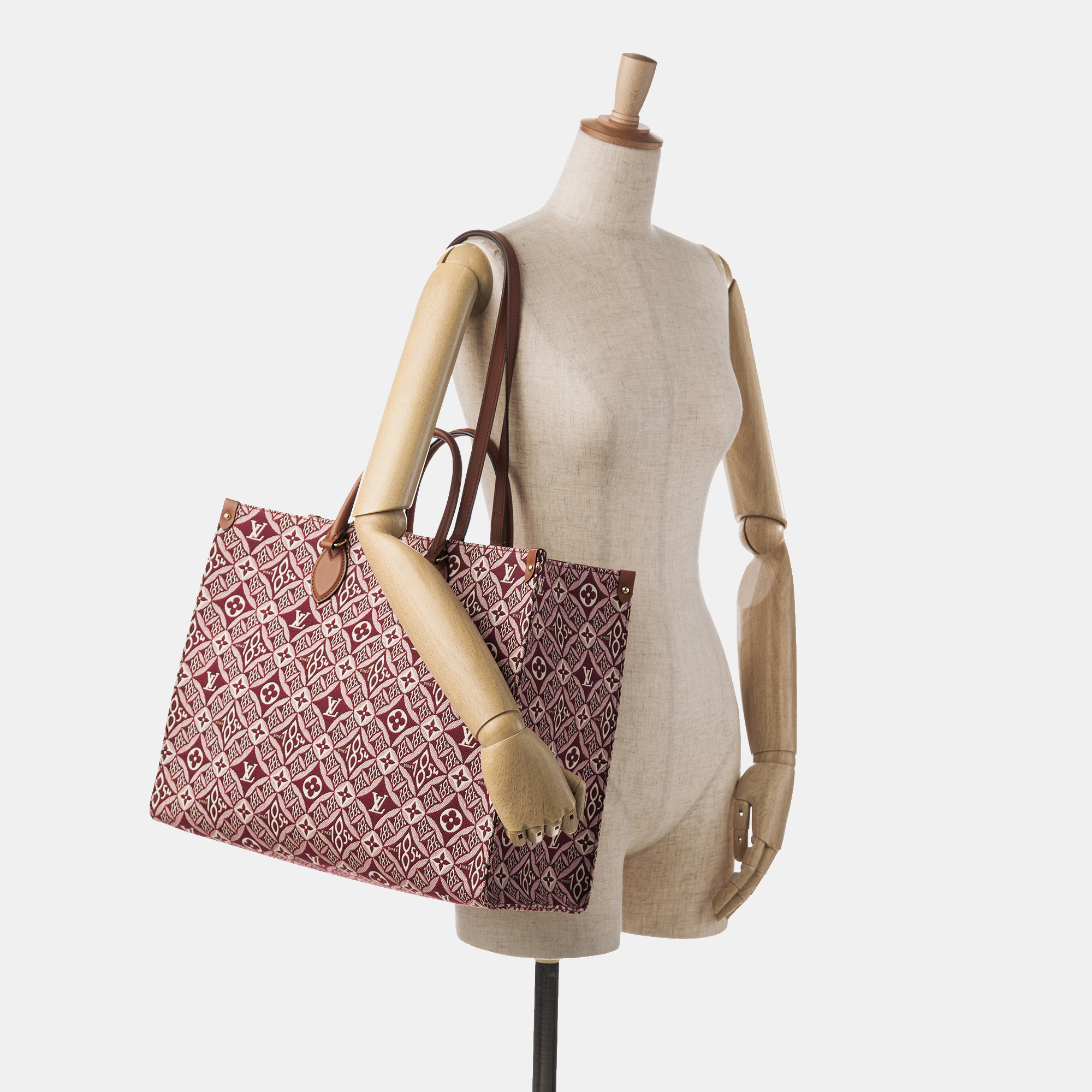 Louis Vuitton Brown Canvas And Fabric Louis Vuitton Monogram Since 1854 Onthego GM