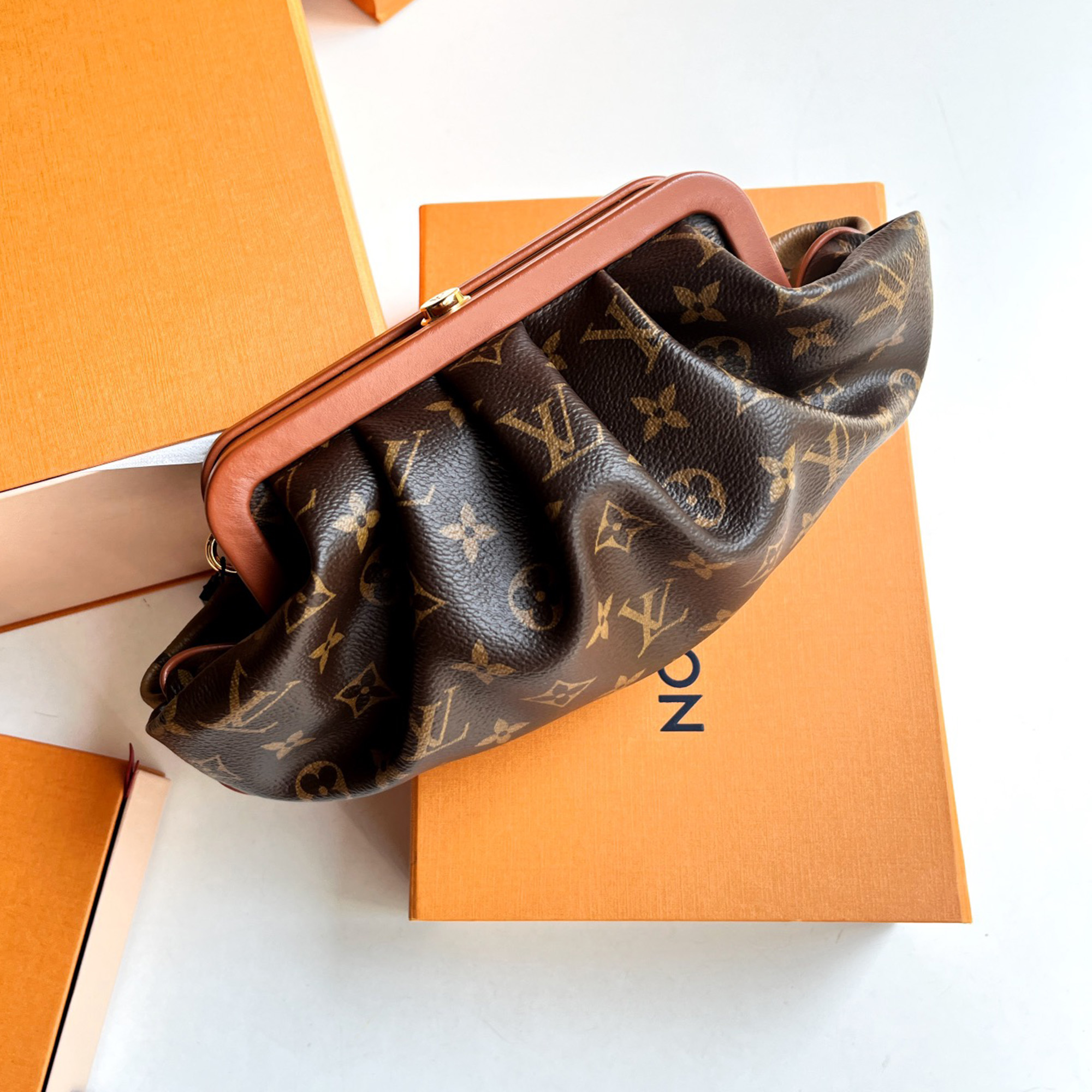 Louis Vuitton Monogram Colorblock Cloud Bag With Chain, Brown
Louis Vuitton Monogram Colorblock Cloud Bag With Chain, Brown