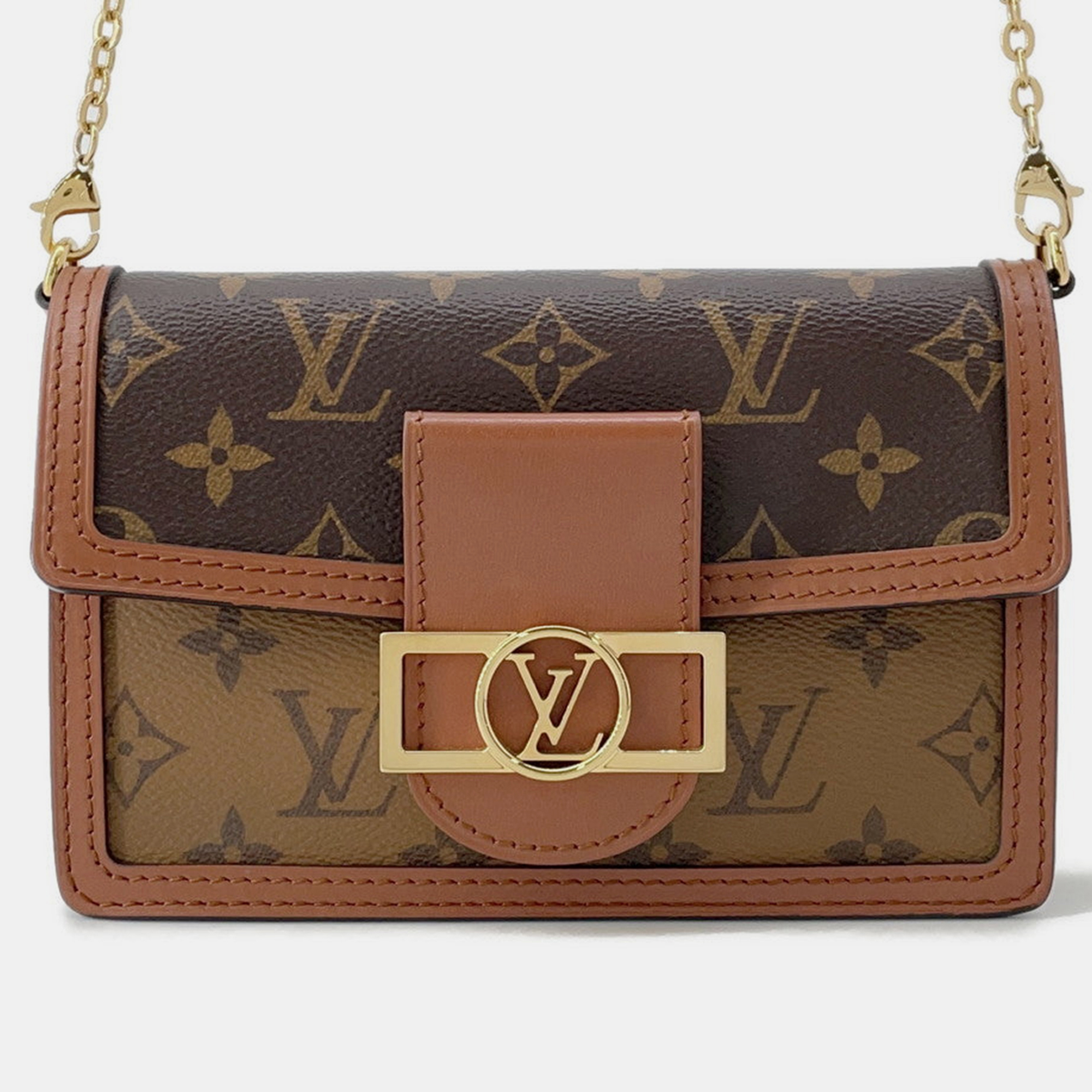 Louis Vuitton Portefeuille Dauphine Noir Monogram/Monogram Reverse Canvas, Brown
Louis Vuitton Portefeuille Dauphine Noir Monogram/Monogram Reverse Canvas, Brown