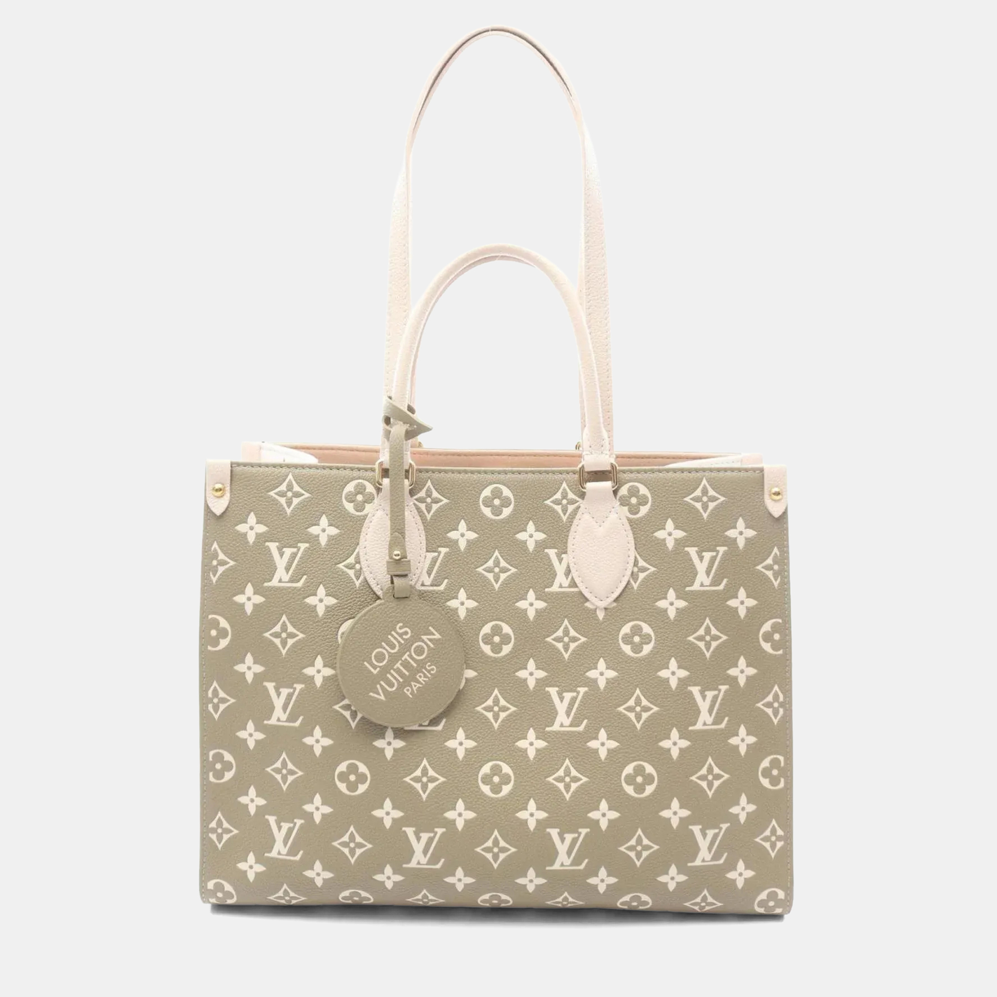 Louis Vuitton OnTheGo MM Khaki Cream Monogram Empreinte Leather Tote Bag
Louis Vuitton OnTheGo MM Khaki Cream Monogram Empreinte Leather Tote Bag