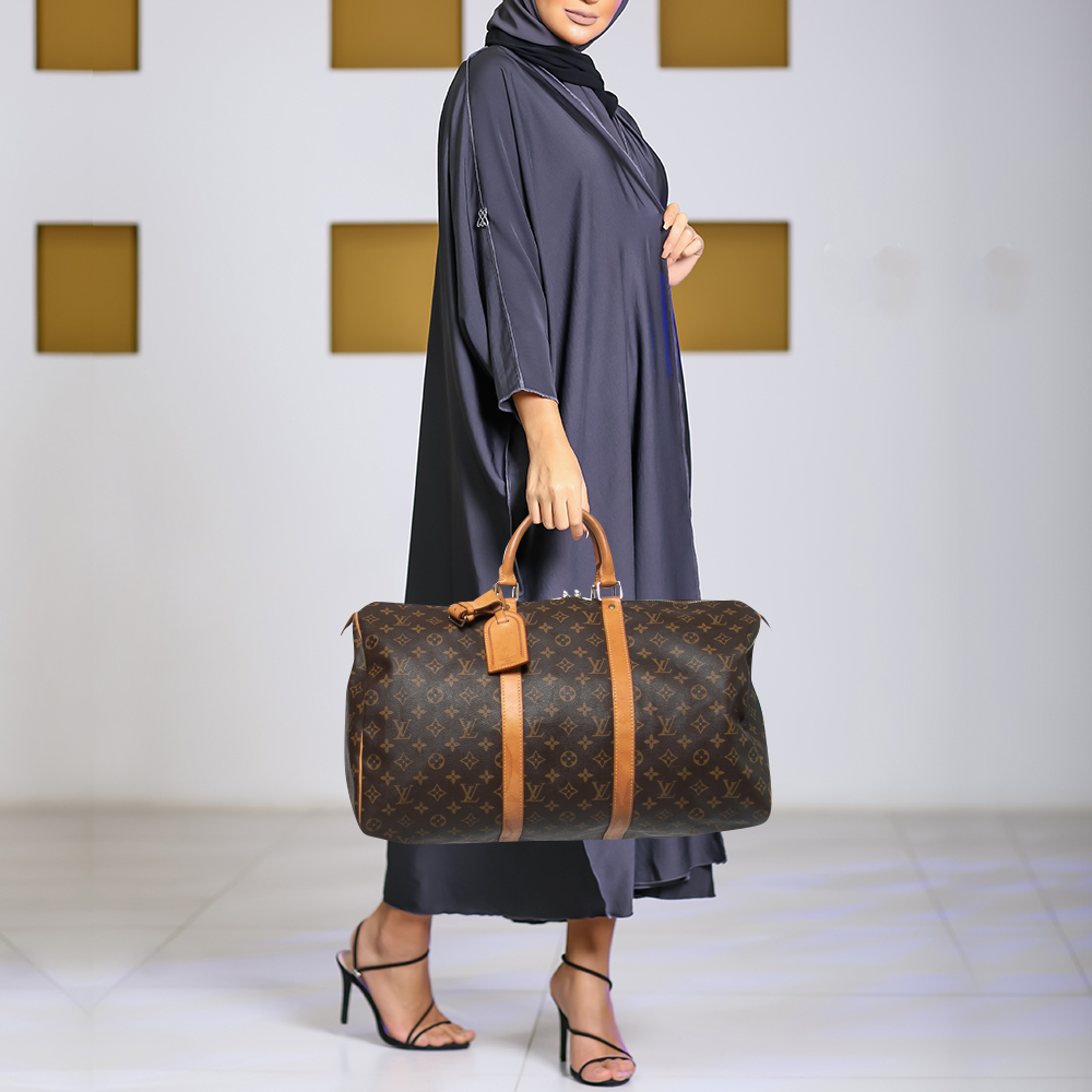 Louis Vuitton Monogram Canvas and Leather Keepall Bandouliere 50 Bag, Brown
Louis Vuitton Monogram Canvas and Leather Keepall Bandouliere 50 Bag, Brown