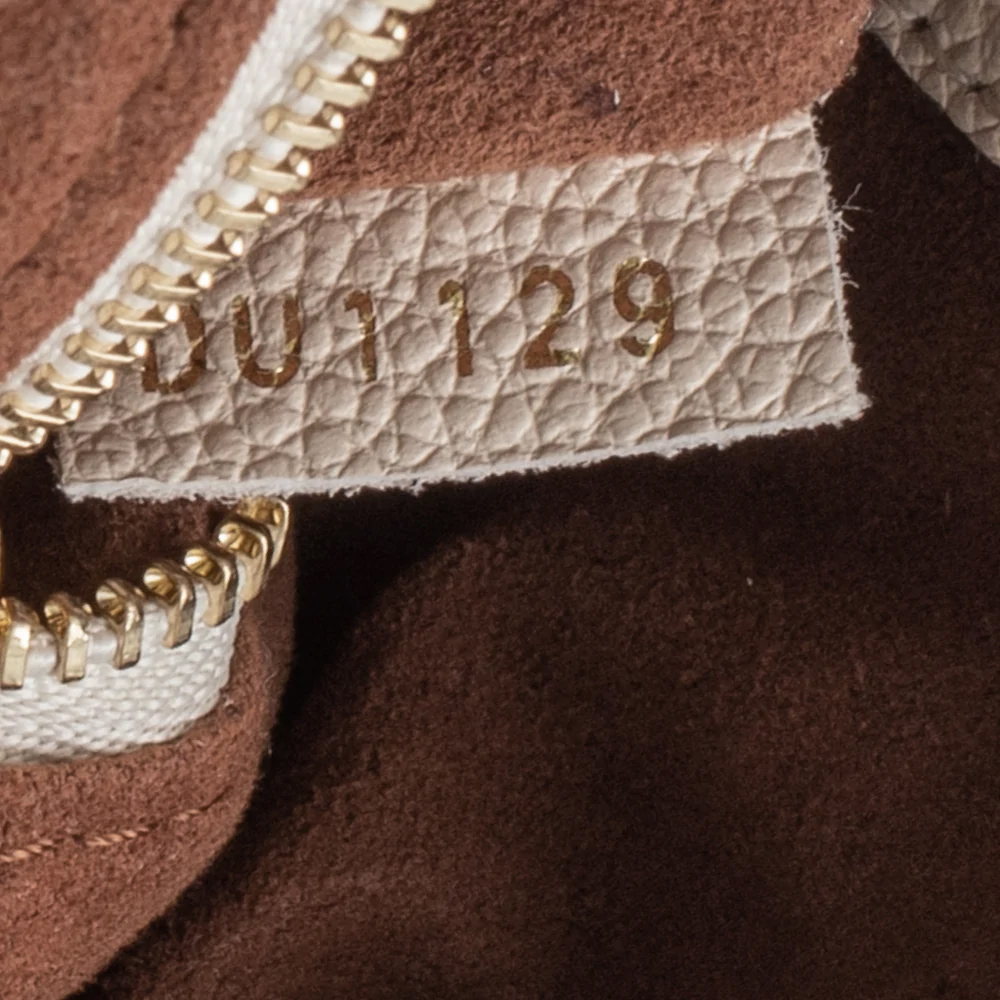 Louis Vuitton Speedy Empreinte Shoulder Bag In Beige Leather