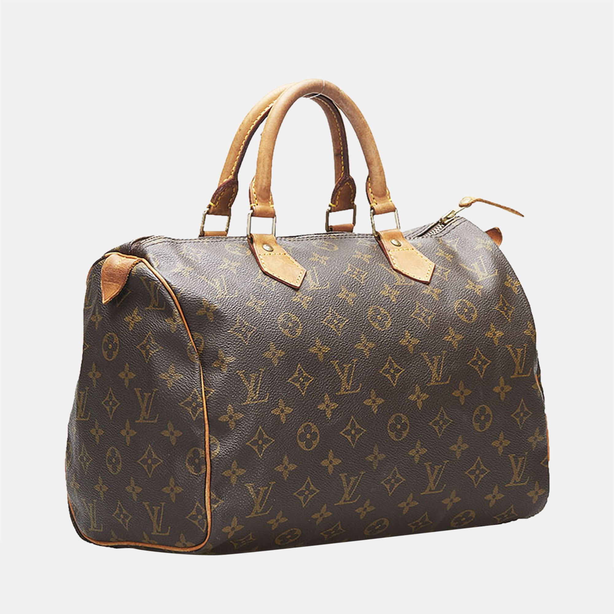 Louis Vuitton Brown Monogram Canvas Speedy 30 Top Handle Bags 
Louis Vuitton Brown Monogram Canvas Speedy 30 Top Handle Bags