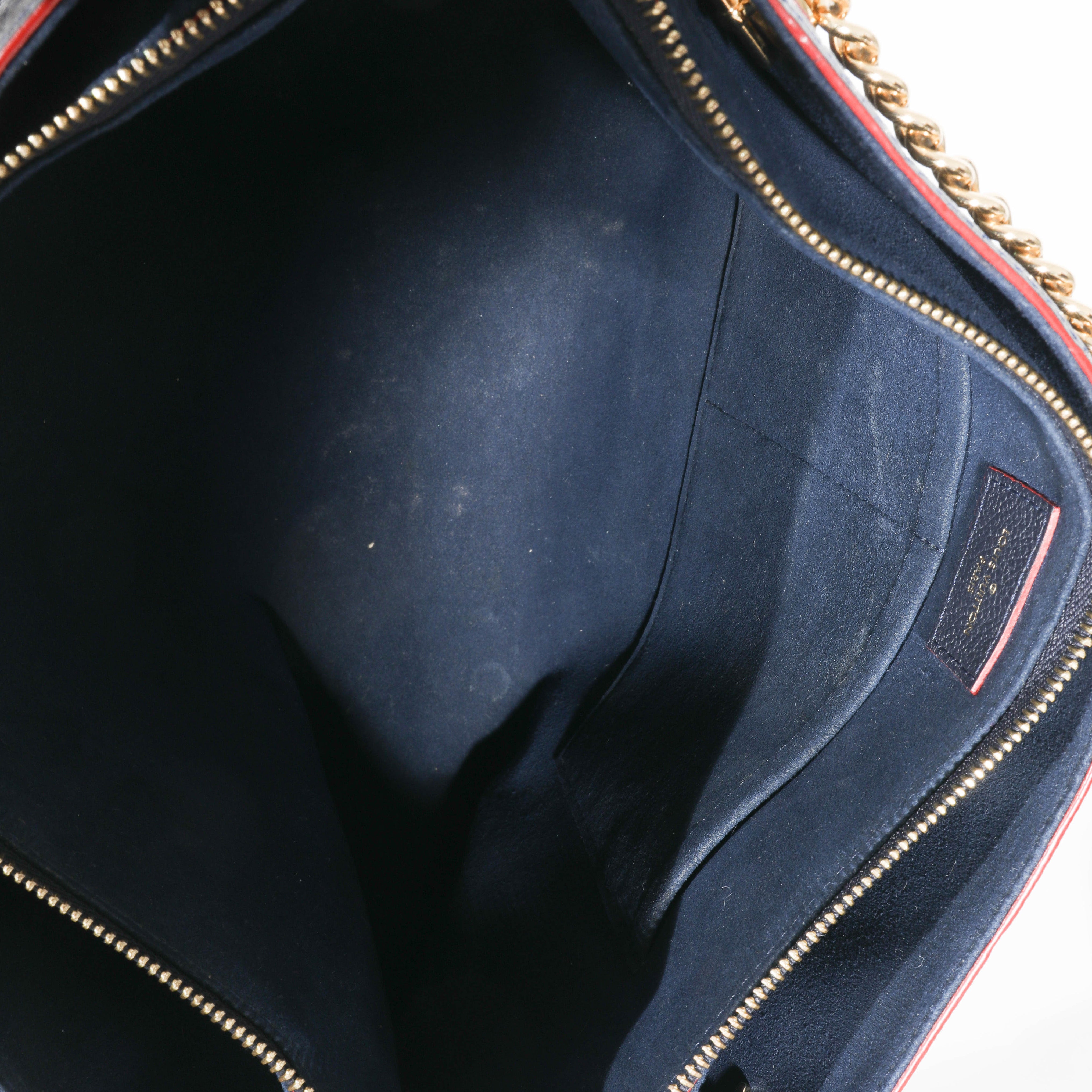 Louis Vuitton Monogram Empreinte Leather Surene MM Bag