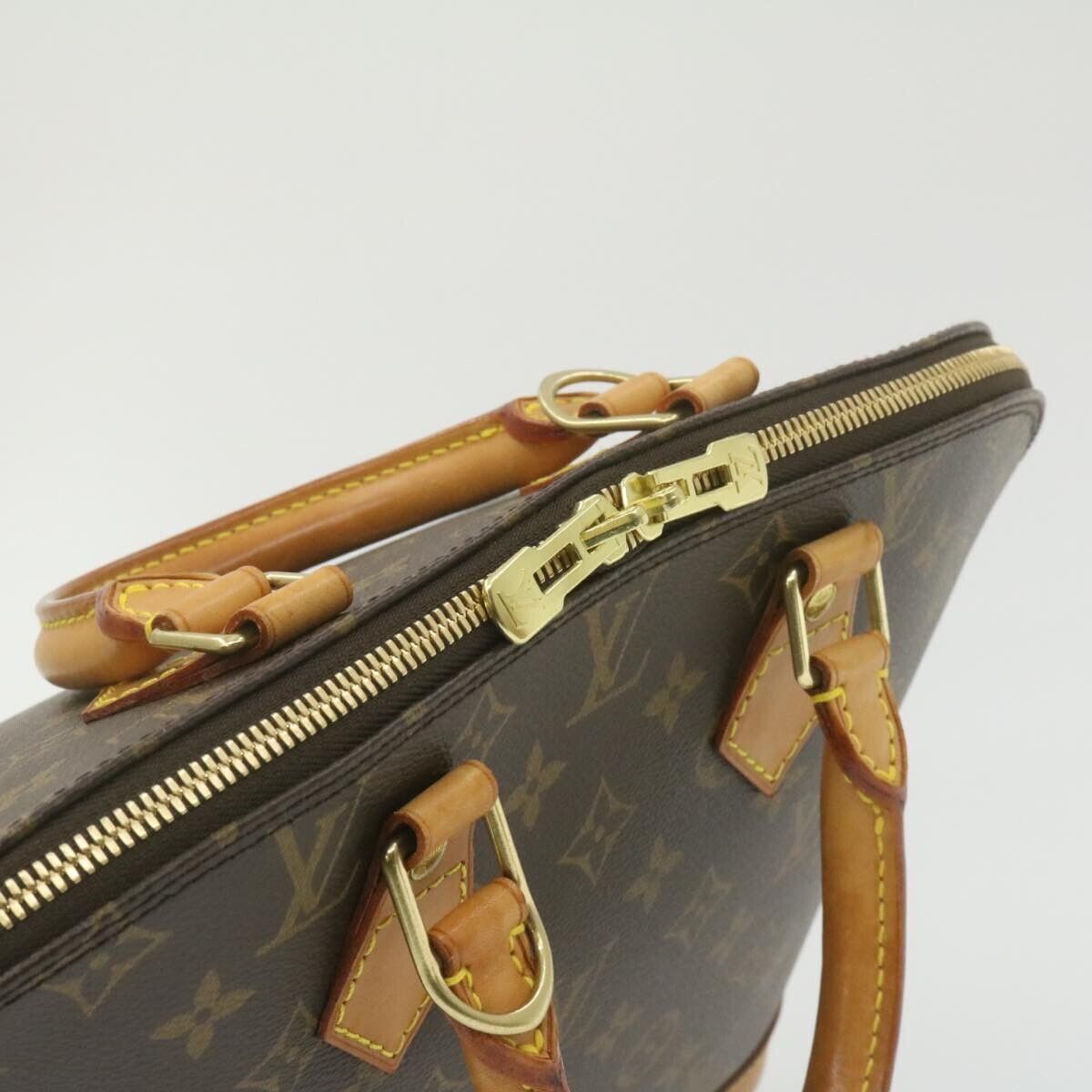 Louis Vuitton Brown Monogram Canvas Alma MM Top Handle Bag